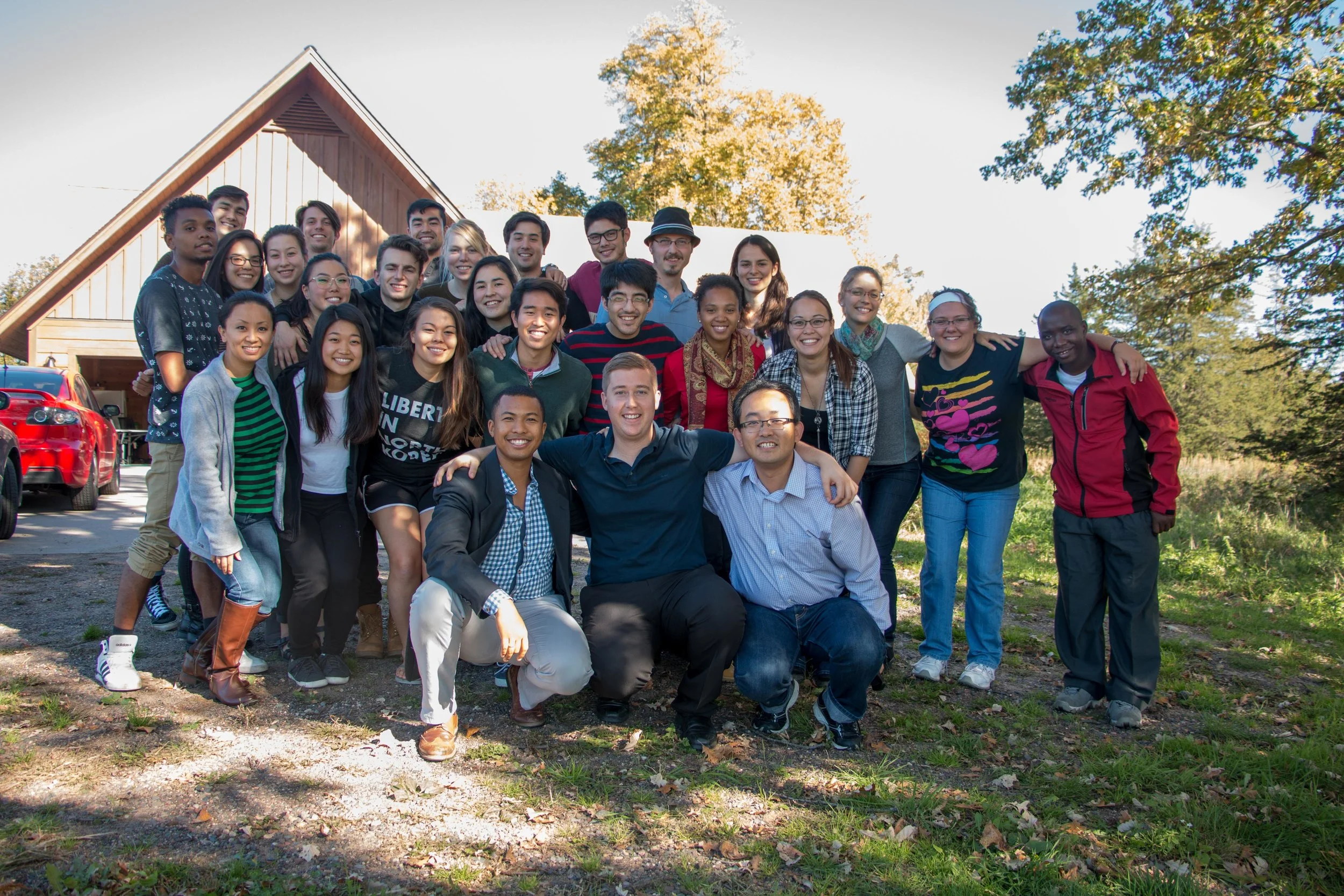 Minneapolis Young Adult event with Kenei in the middle behind his future coach, Neil Rischl.