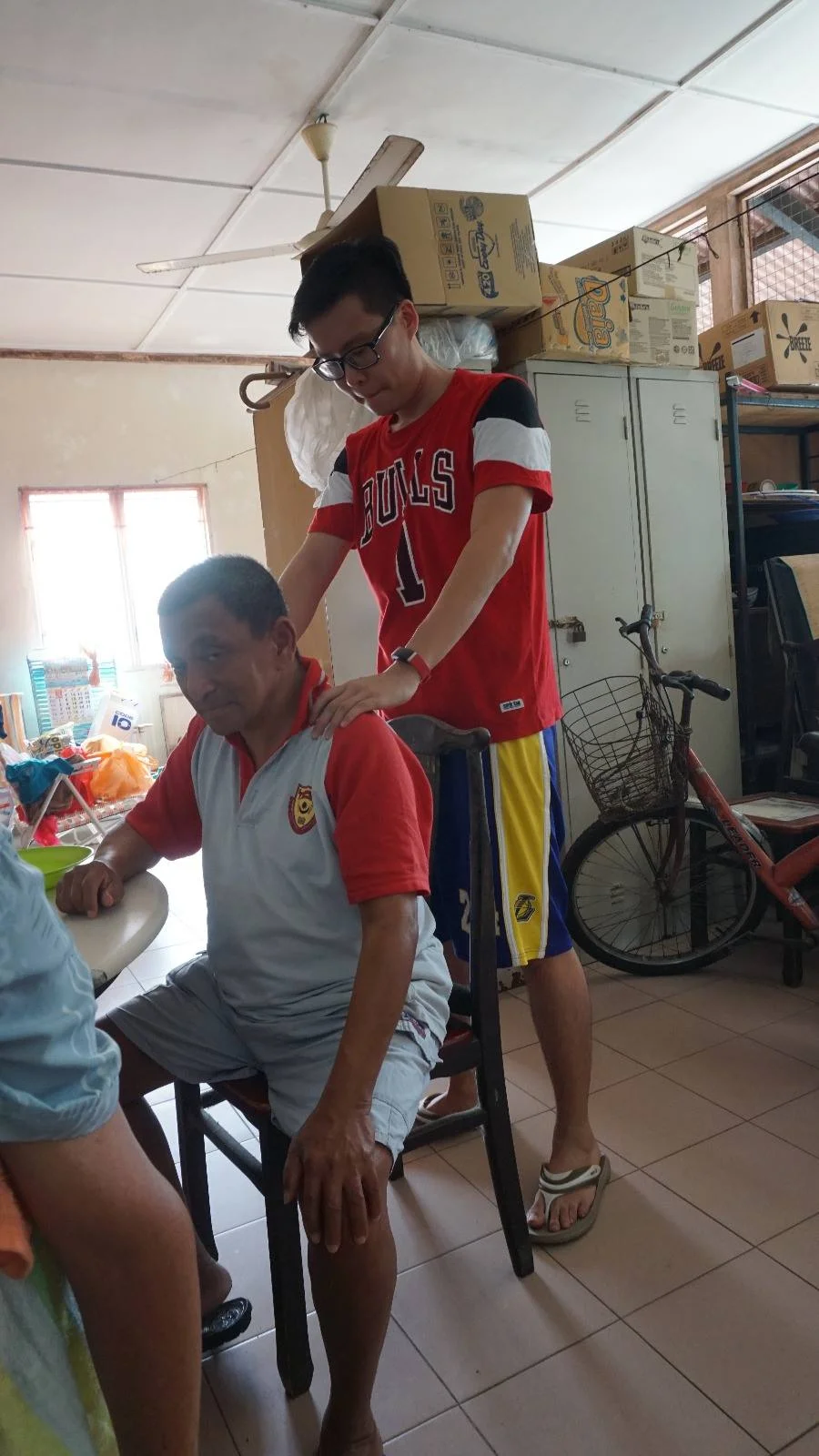 CARP member massaging an elderly person