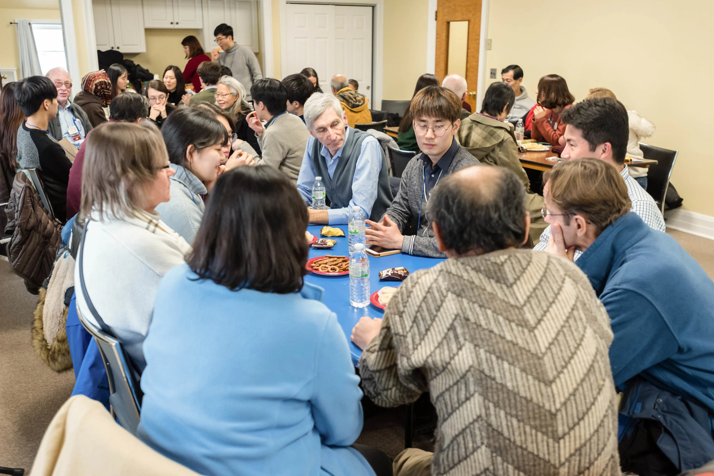 Students and adult participants engage in enlightening discussions after the presentations.