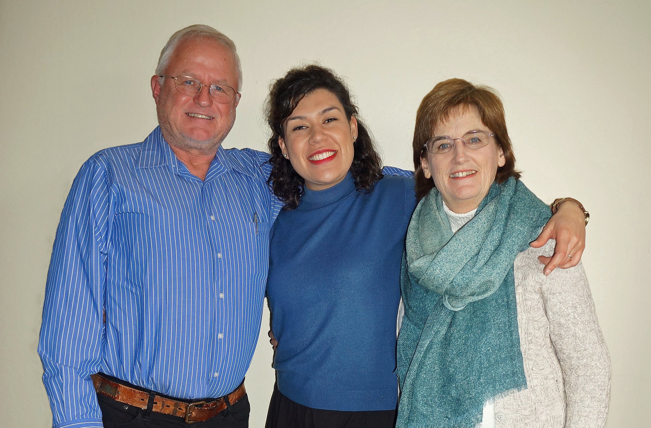 Christine with her husband and daughter.
