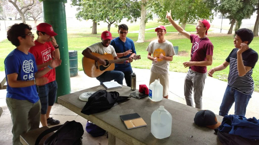 Their morning singing to bring up the spirit before fundraising. 