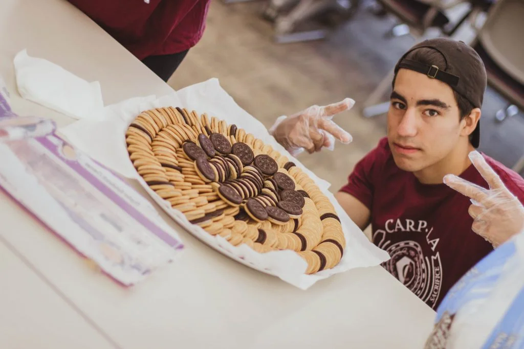 Ori Morton posing by the cookies.