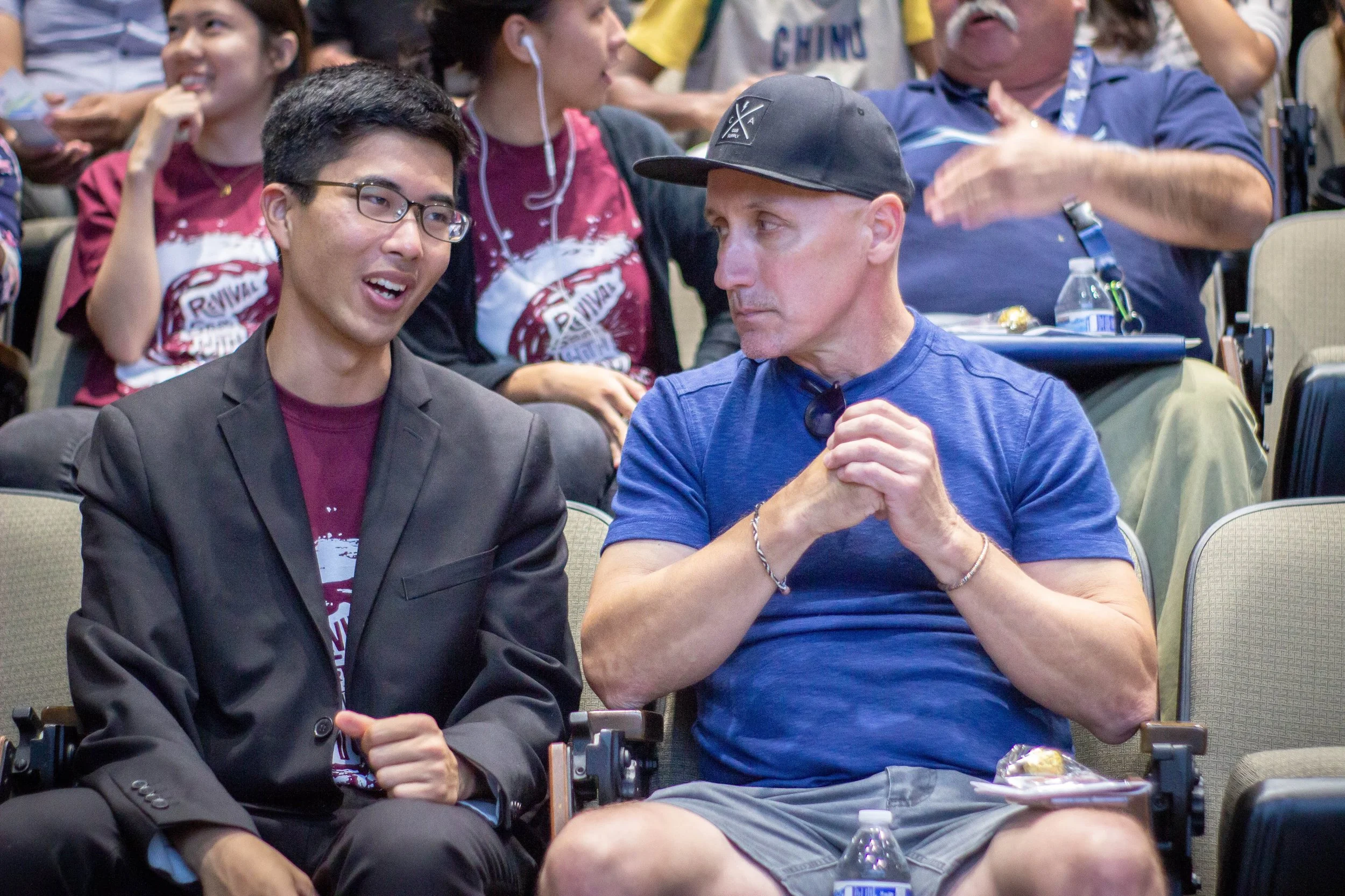 CARP ECC officer Kodai Abe (left) and CARP ECC advisor Professor Kurt Hull (right) discuss the future for professors and students.