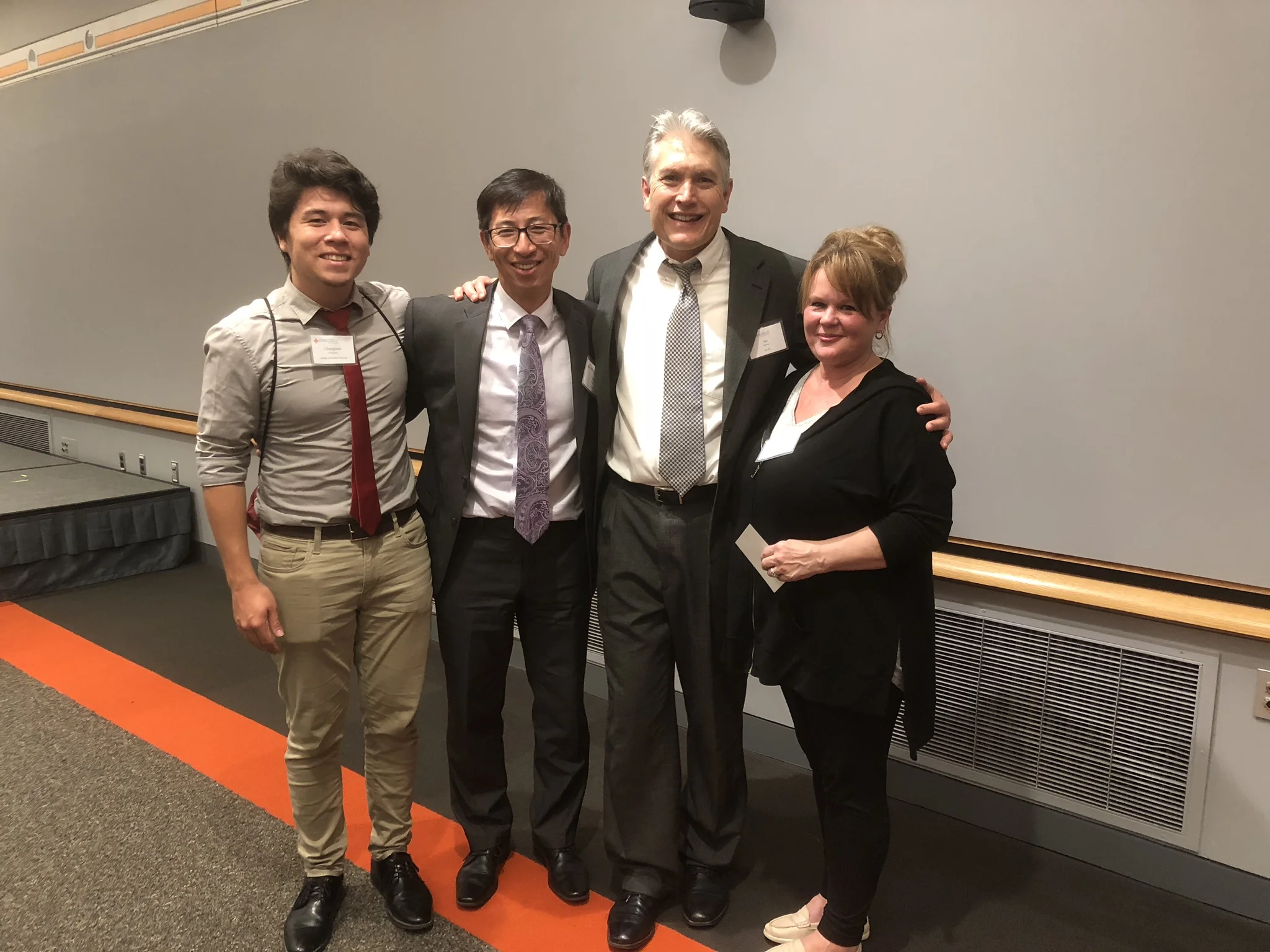 Dr. Malone (second from the right) gladly takes a photo with our CARP team.