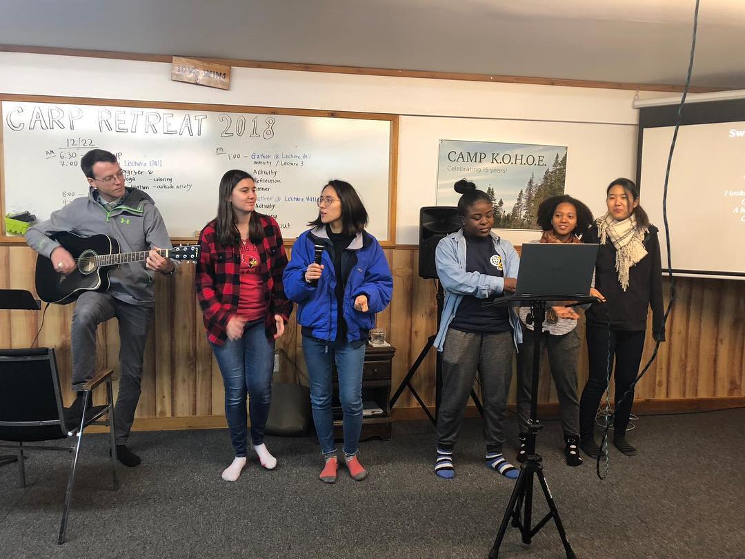 To set the atmosphere, the retreat sang songs.