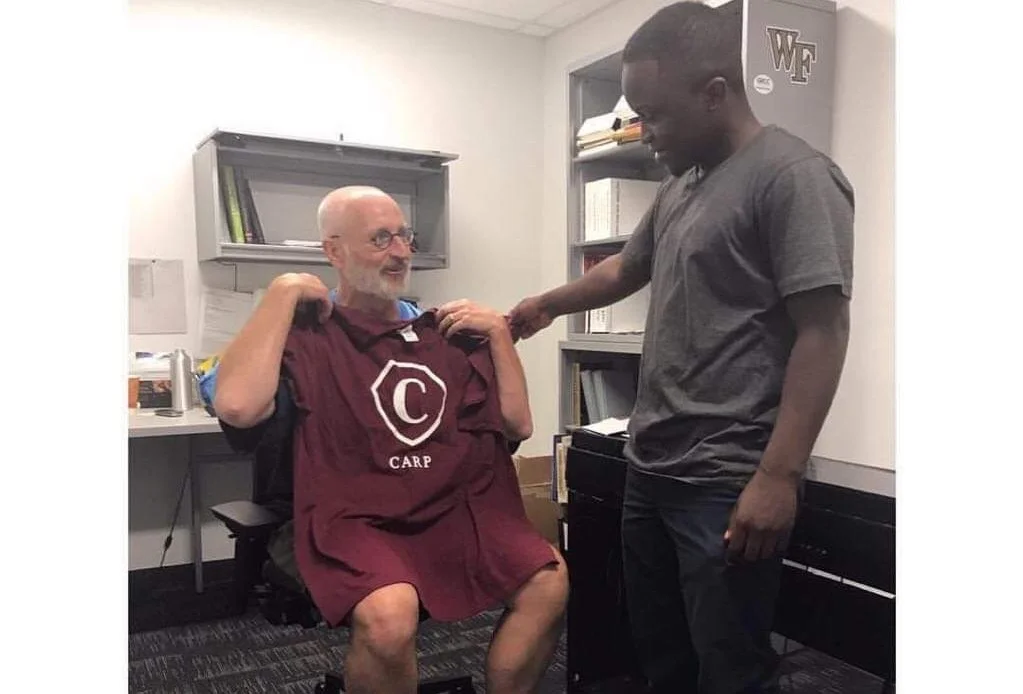 Josue (right) and the CARP GRCC advisor, Dr. Stephen Barton (left), both work hard so that students are taken care of in CARP.