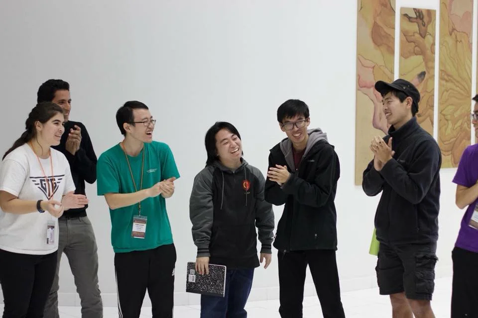 Takafumi (middle) and his core team.