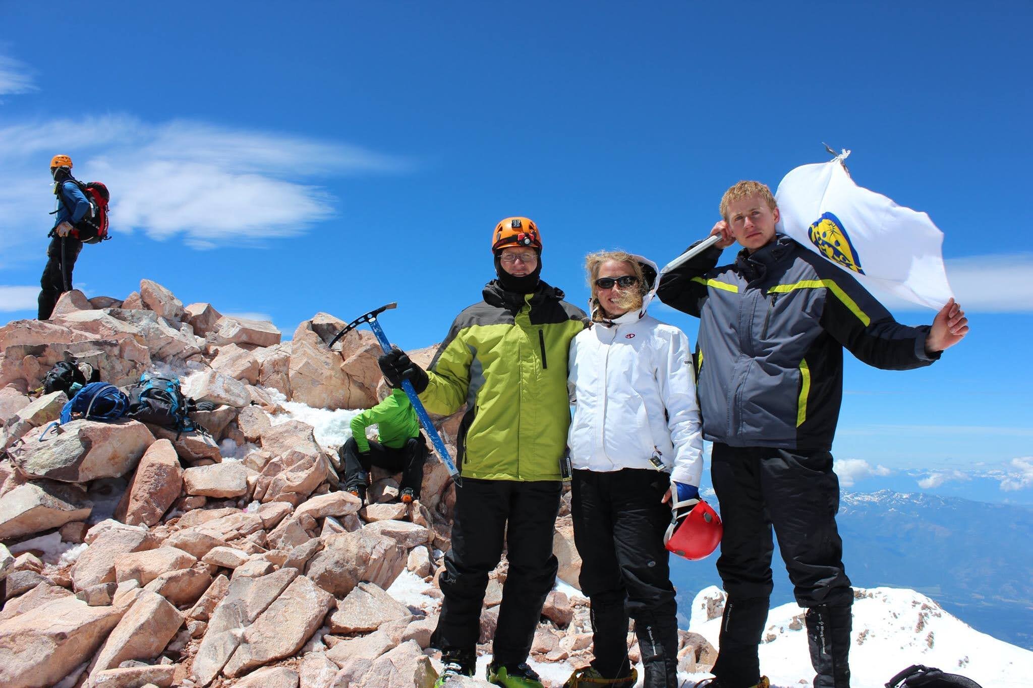  Gabriela (middle), her father (right), and her brother (left) climb Mount Shasta.  