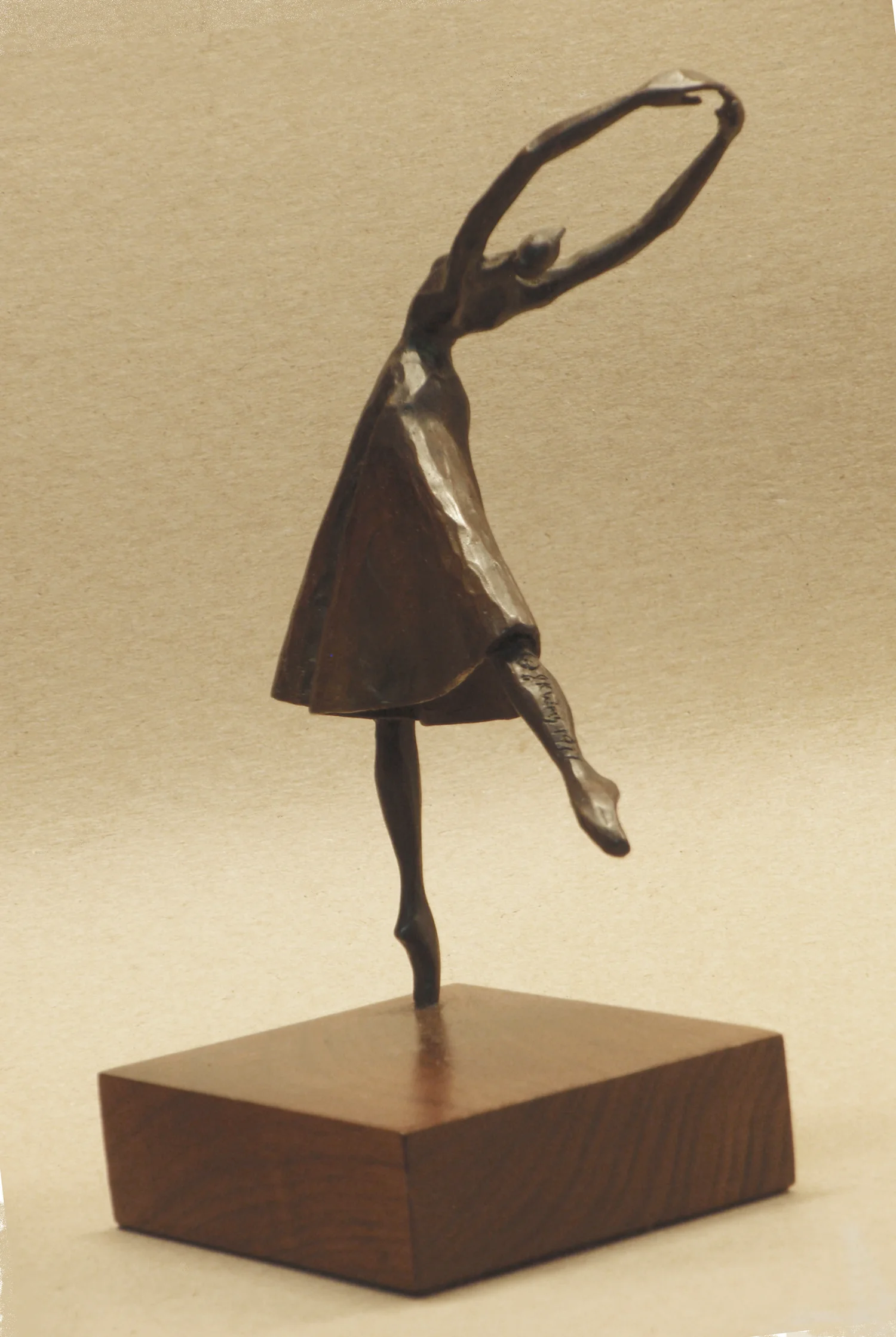 "Back Bend Arabesque" Bronze and walnut 7 1/2 x 5 1/4 x 4"