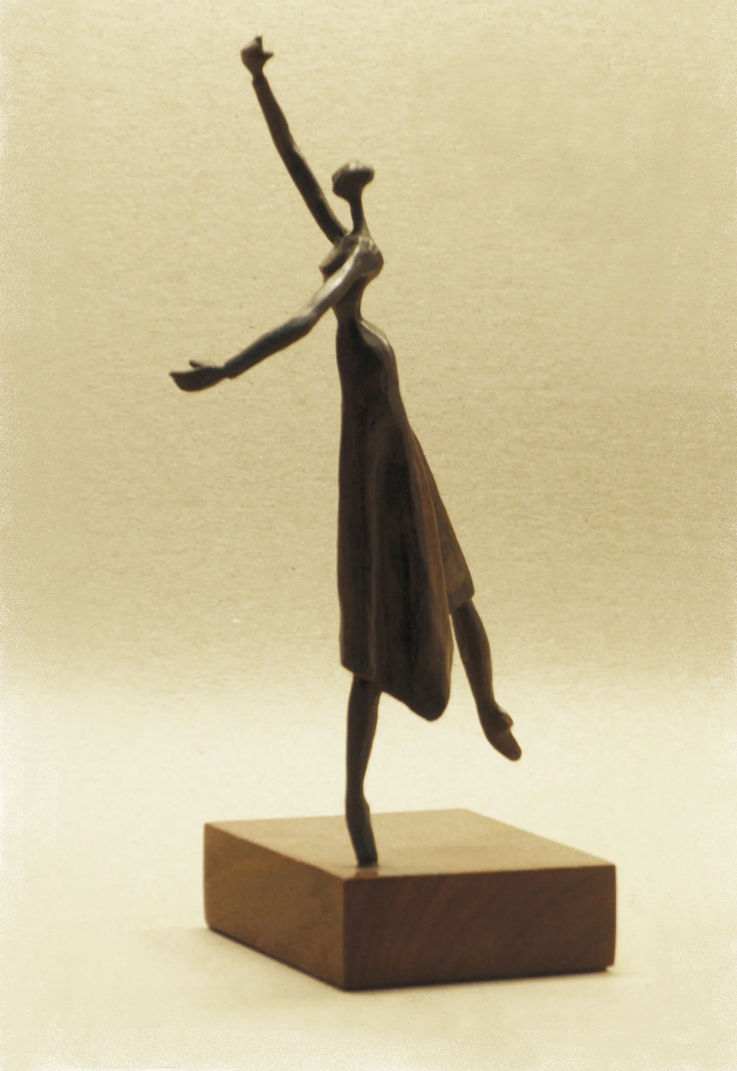 "En Pointe" Bronze and walnut 9 1/8 x 4 1/4 x 3 3/8" 