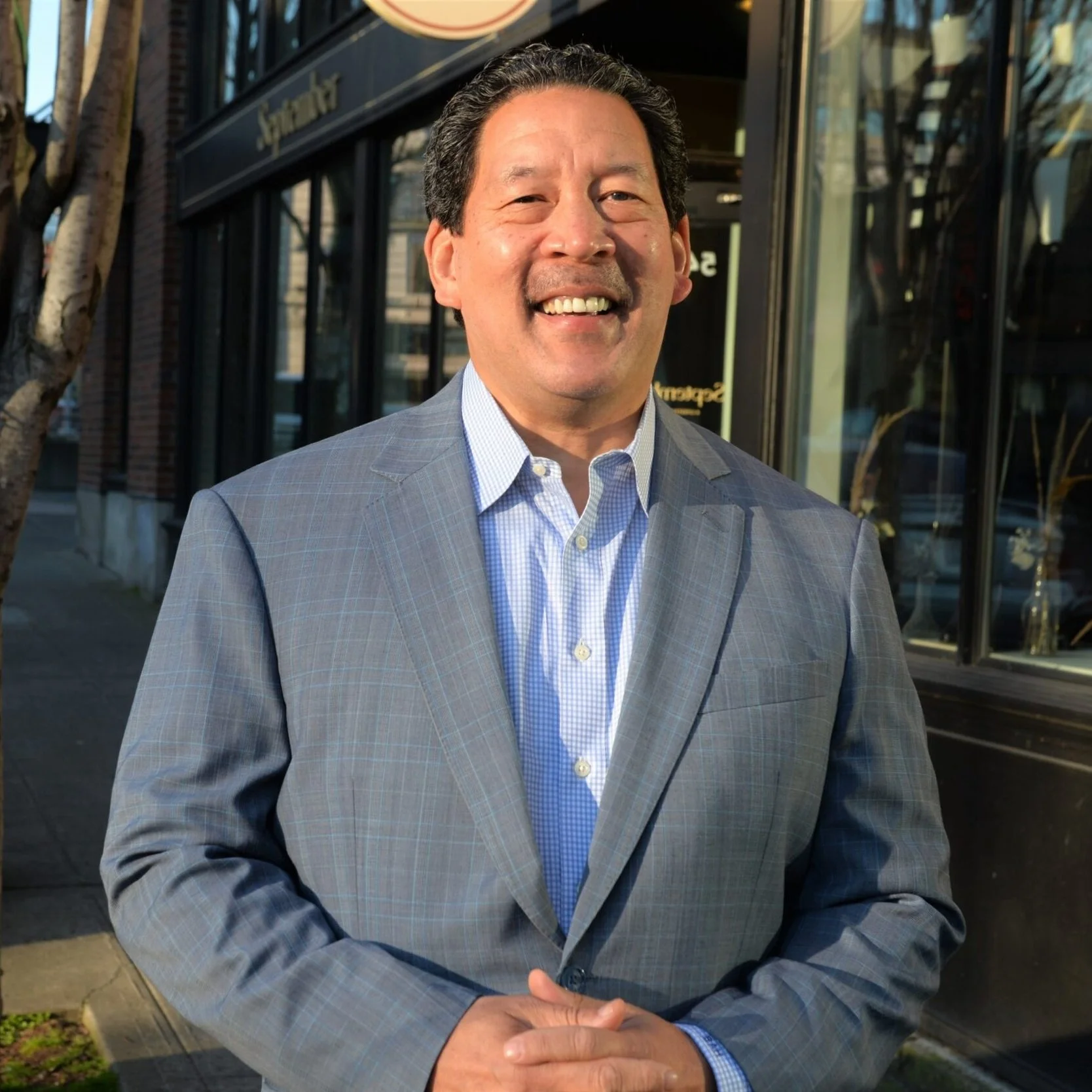 An image of Bruce Harrell smiling at the camera