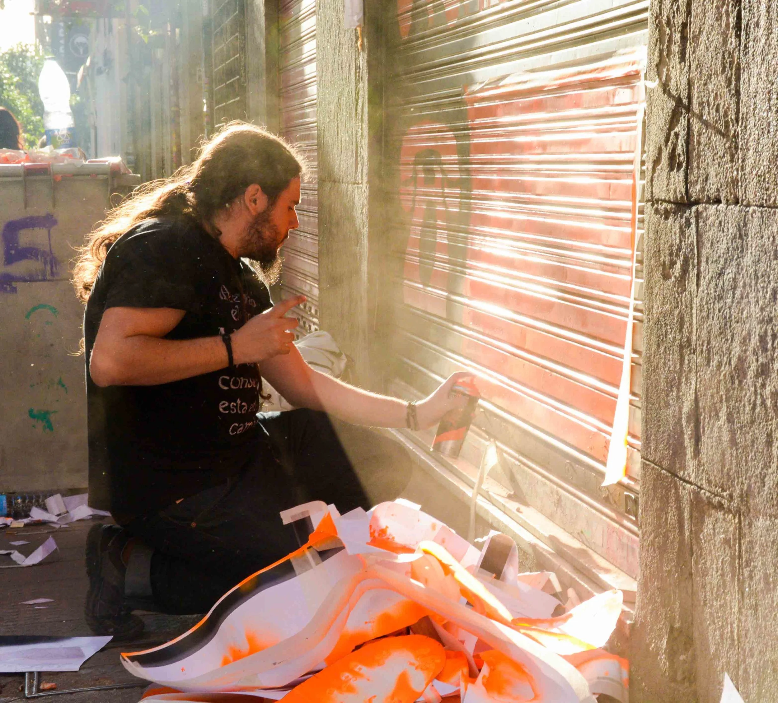 A street artist works on a piece during Pinta Malasaña 2017 in Madrid.