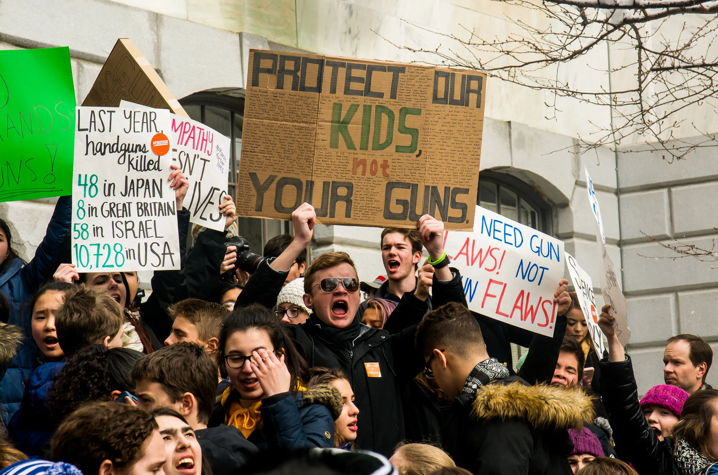 Protestors gather outside the Massachusetts State House during the Walkout for Action on March 14.