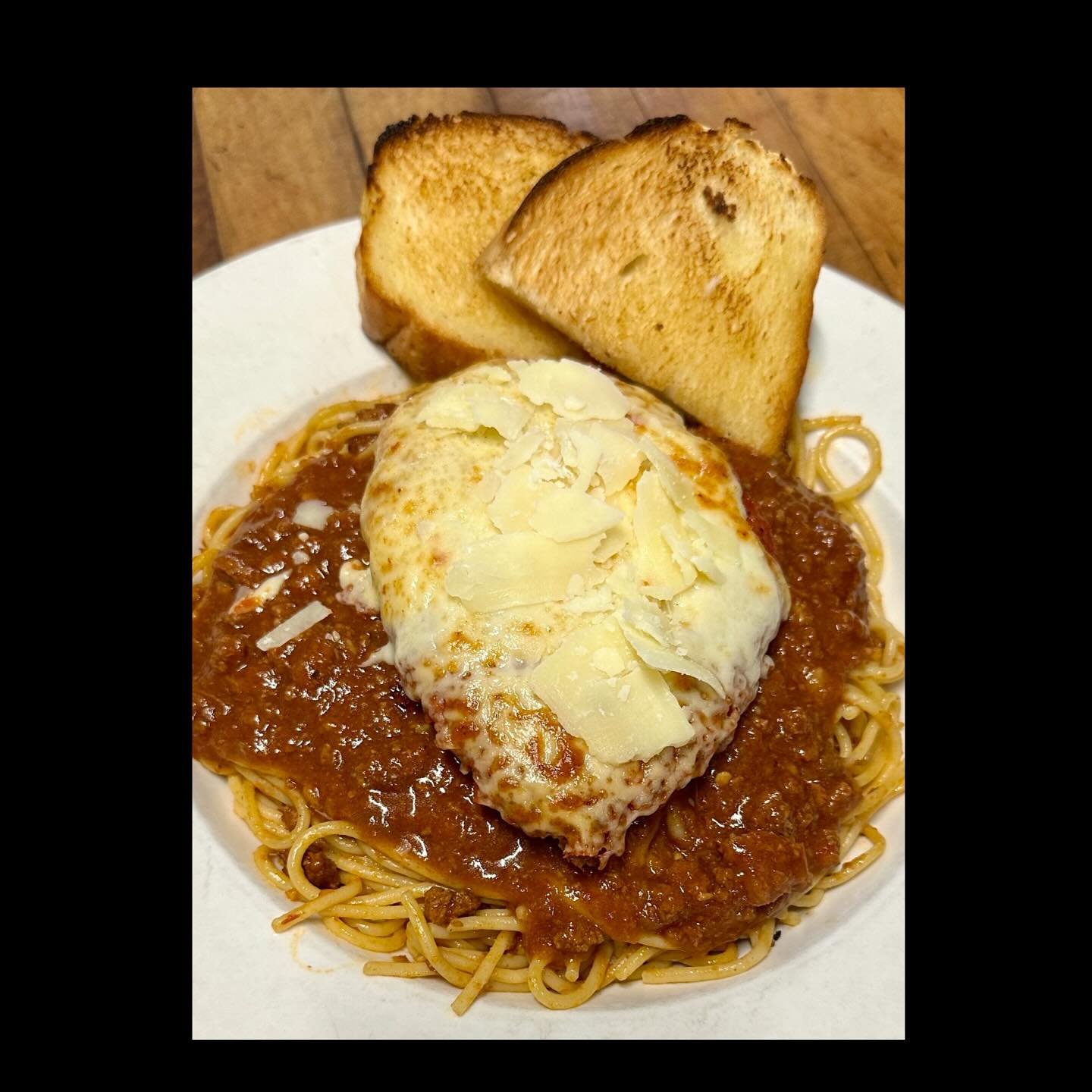 CHICKEN PARMESAN! 
By popular demand, and since it was one of the most popular items on our Dine Out menu, we have added Chicken Parmesan to our regular menu!

Delicious Chicken Parmesan served with spaghetti and meat sauce, garden salad, with your c