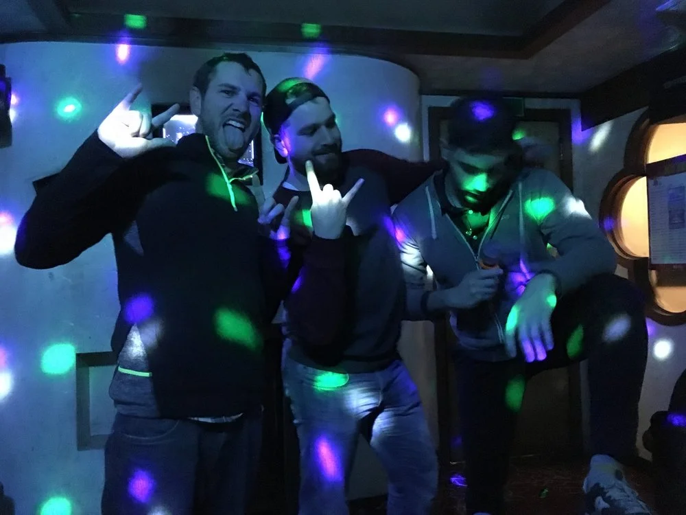The boys celebrating their epic Norebong song.