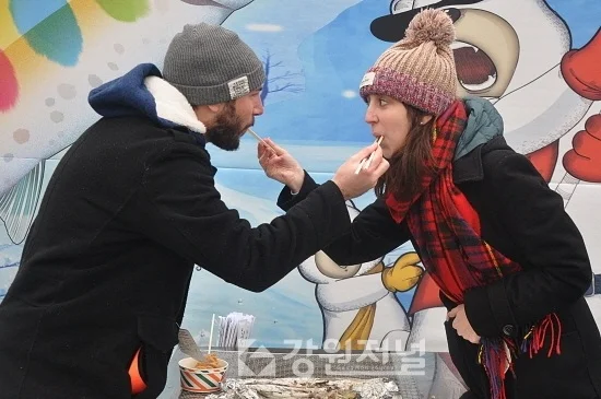 Feeding each other with chopsticks as if we do this every day because…The Press.