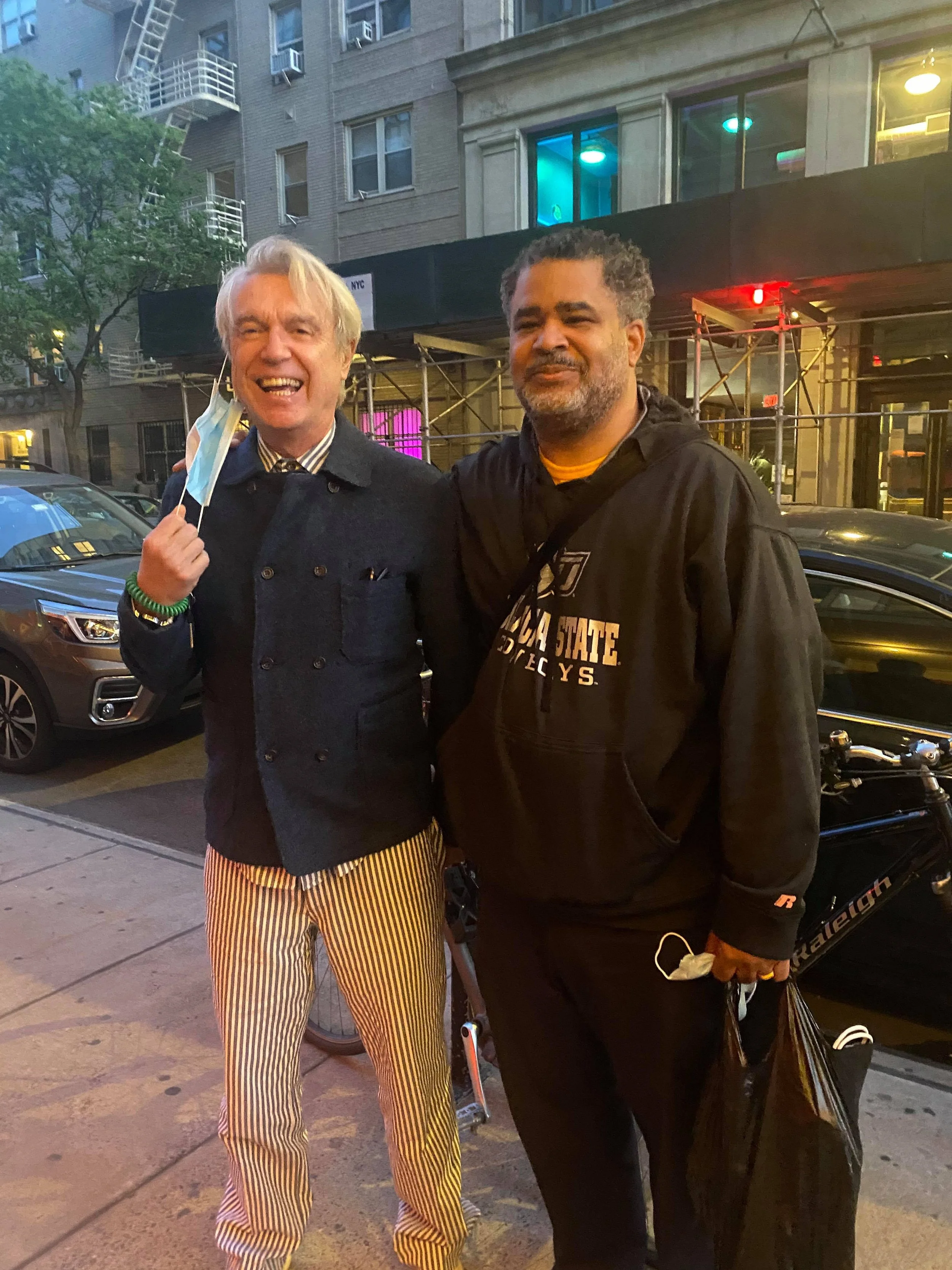 Musician David Burns and Dr. Reynaldo Anderson in front of NY LIVE Arts theater