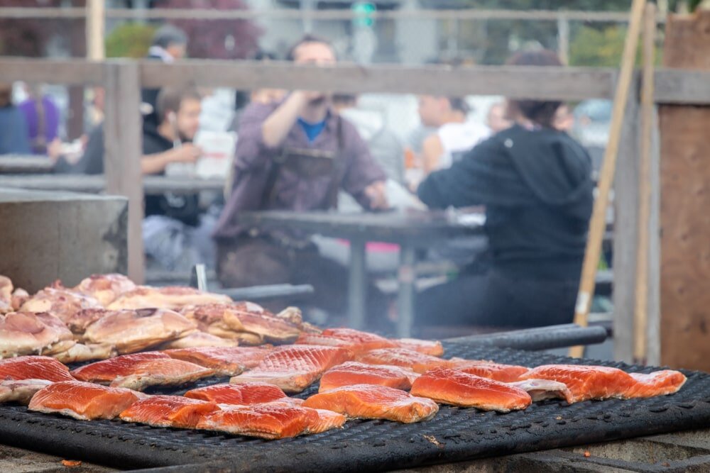 Chicken and Smoked Salmon Grilling Over the Coals