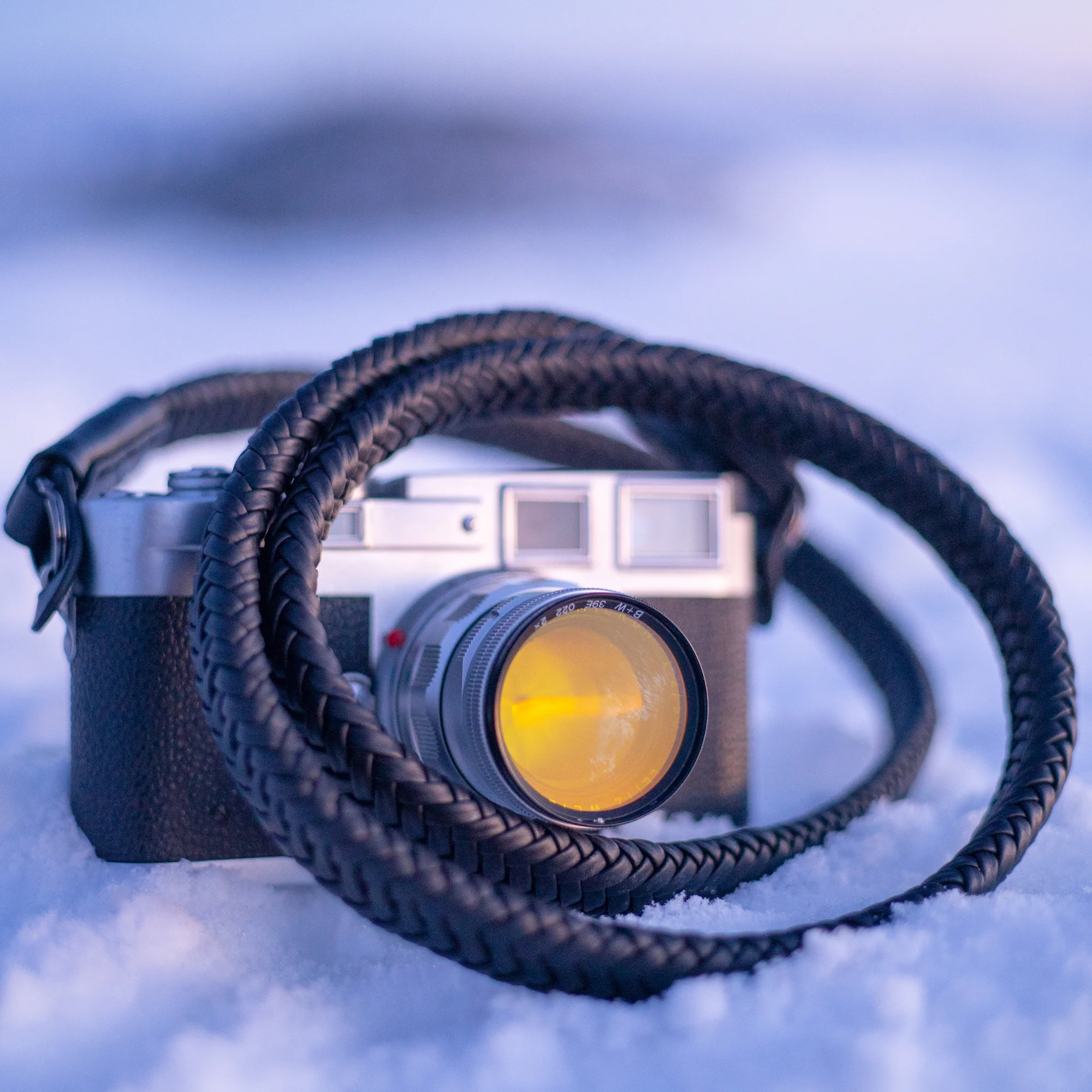 Matador Noir Leather Camera Strap in the Snow by Ryan Mcginty
