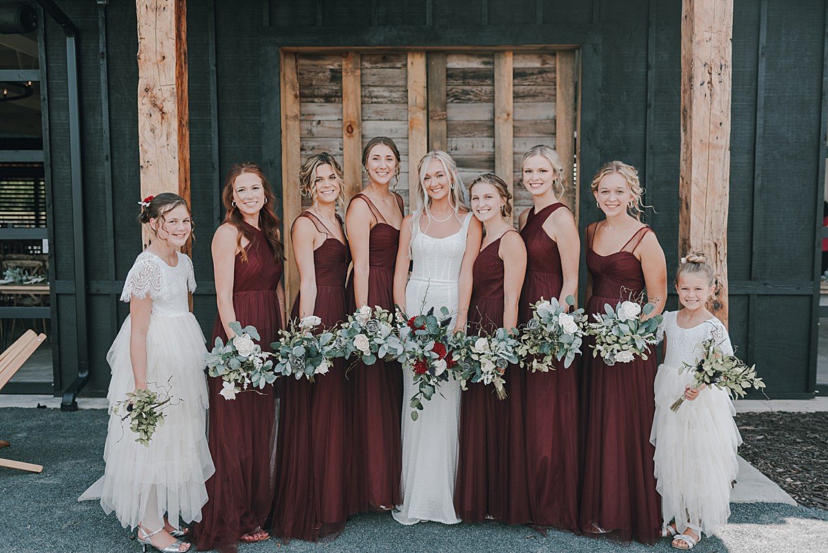 bridesmaids-at-the-grainary-at-lake-valley-farm-wedding.jpg