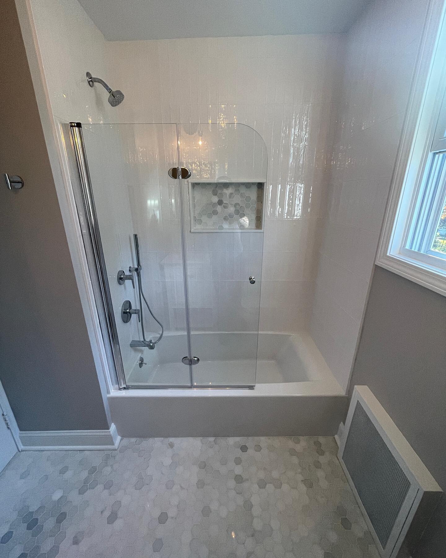 Bathroom remodel in Spring Glen. The original shower/tub gave out and wreaked having on the bathroom and the dining room below. 

After mitigating the asbestos, we went ahead with the bathroom restoration. 2 days of demo to remove the cement, metal l