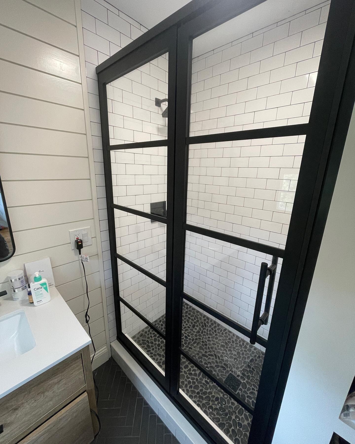 Forgot to post these black metal framed doors we had made for this custom sized shower a few months back. They are well built shower doors and a bold choice that makes the whole bathroom look amazing.