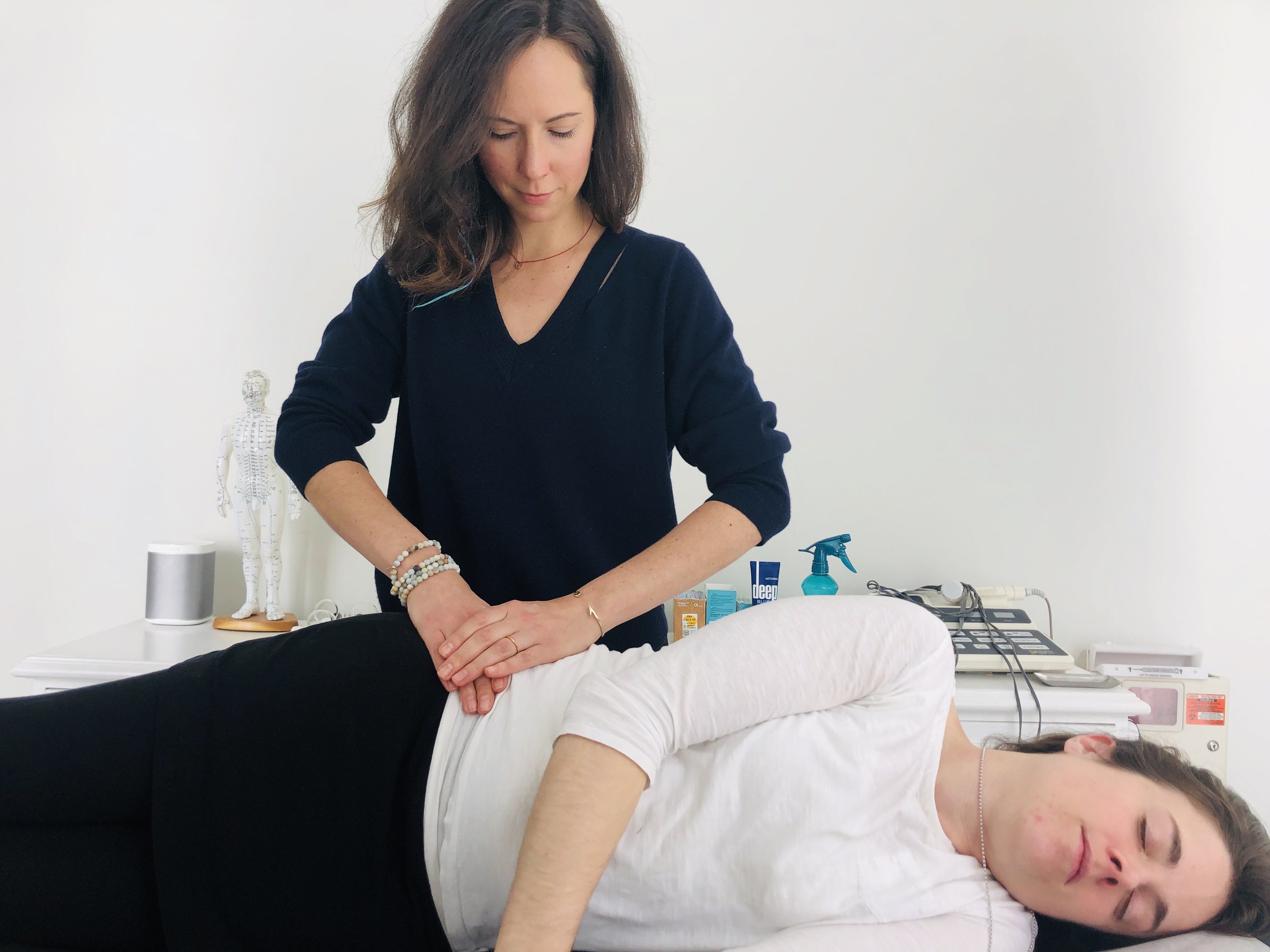 Dr. Jaclyn Amaro, Centered Chicago. Administering Active Release Technique.