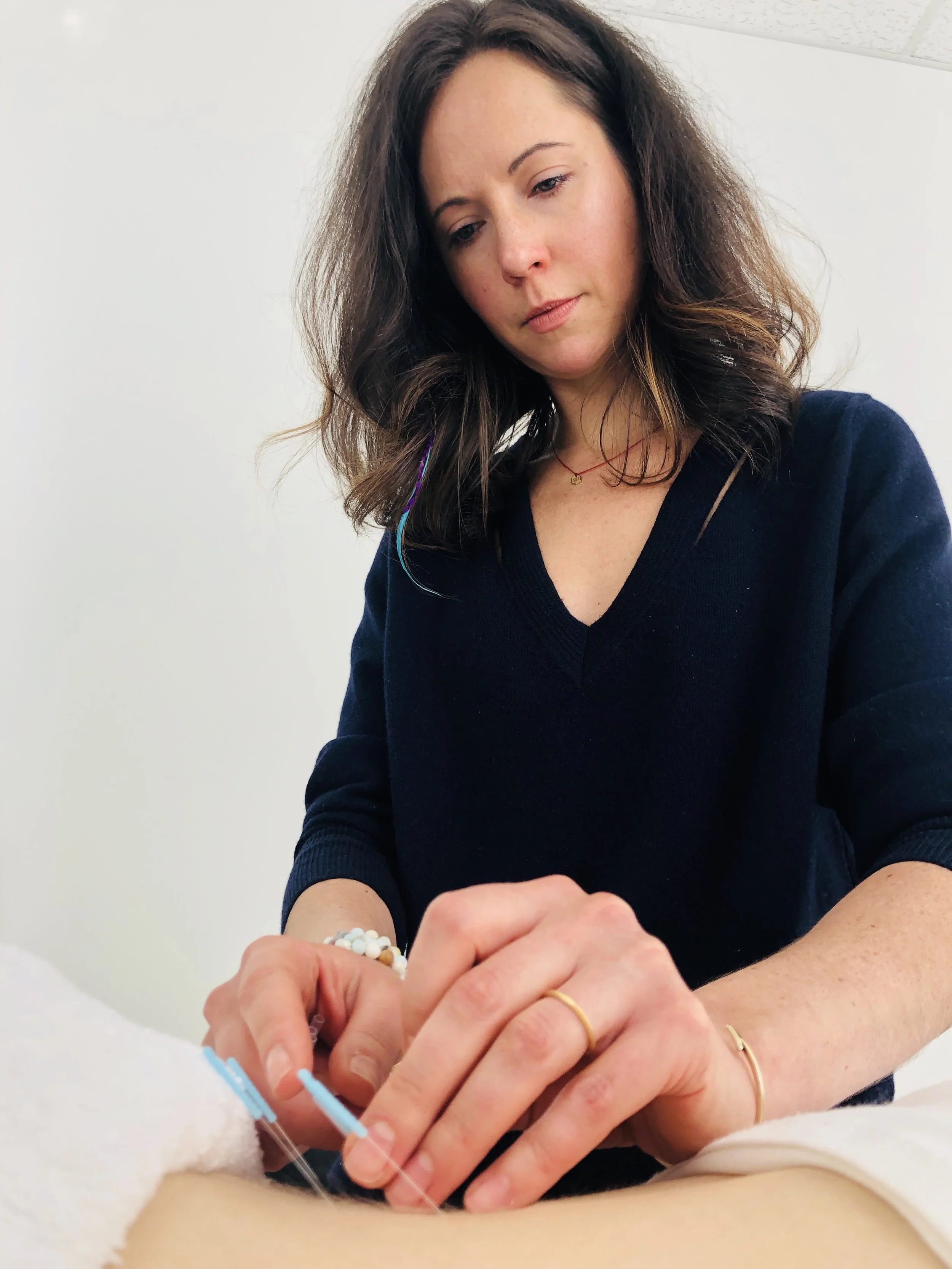 Dr. Amaro administering NAET treatment.
