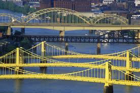 These Pittsburgh bridges, painted in Aztec Gold, are among the 446 in the city. Portland is hardly competitive with its 12 spans across the Willamette.