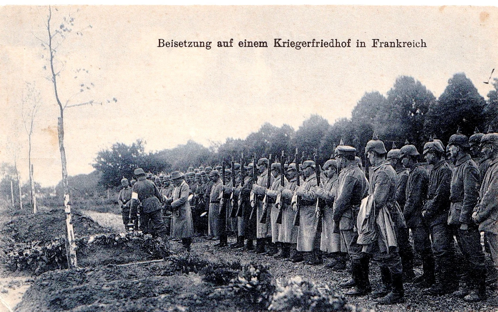 BURIAL AT A WAR CEMETERY IN FRANCE: in 1916, my mother received this postcard of German soldiers burying their dead on foreign soil.
