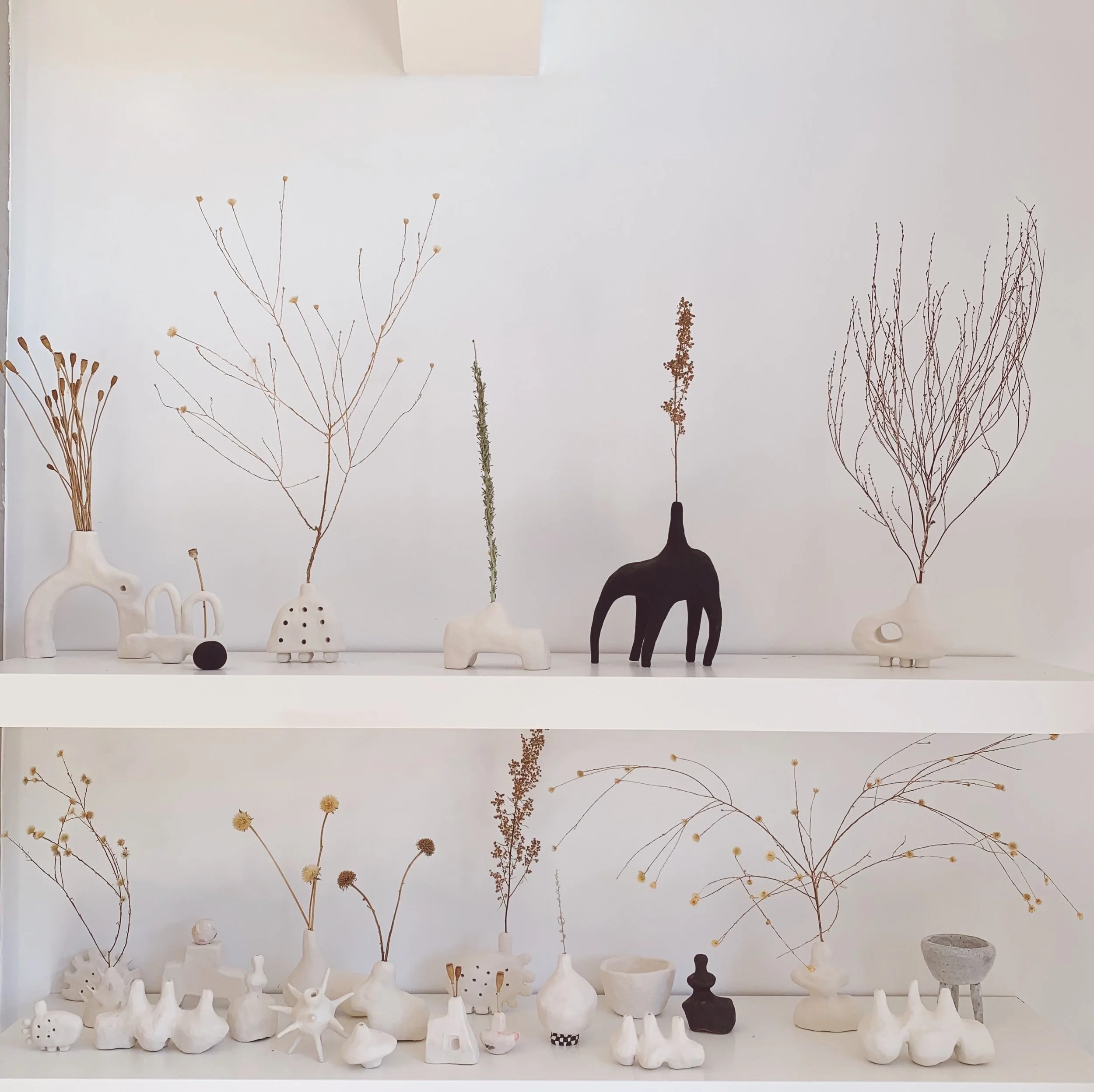 Collection of small sculpture studies by Nancy Purvis.jpeg