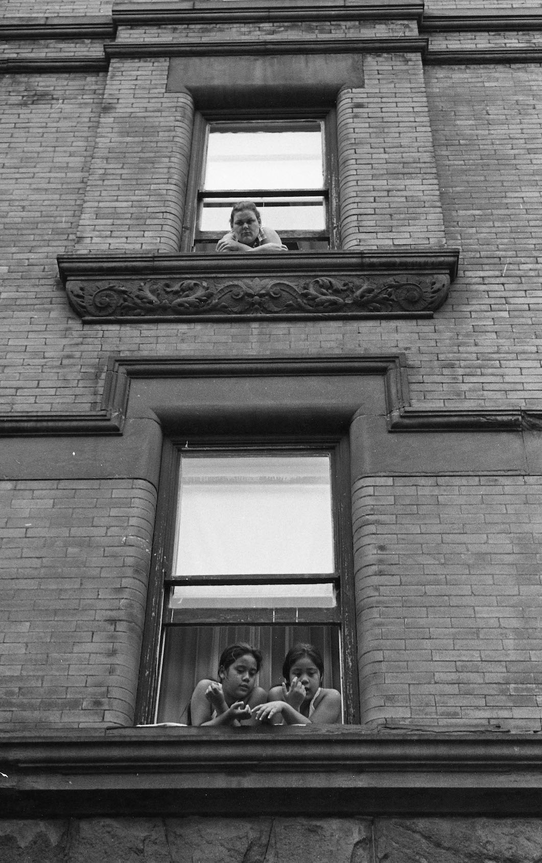 Three People in Window