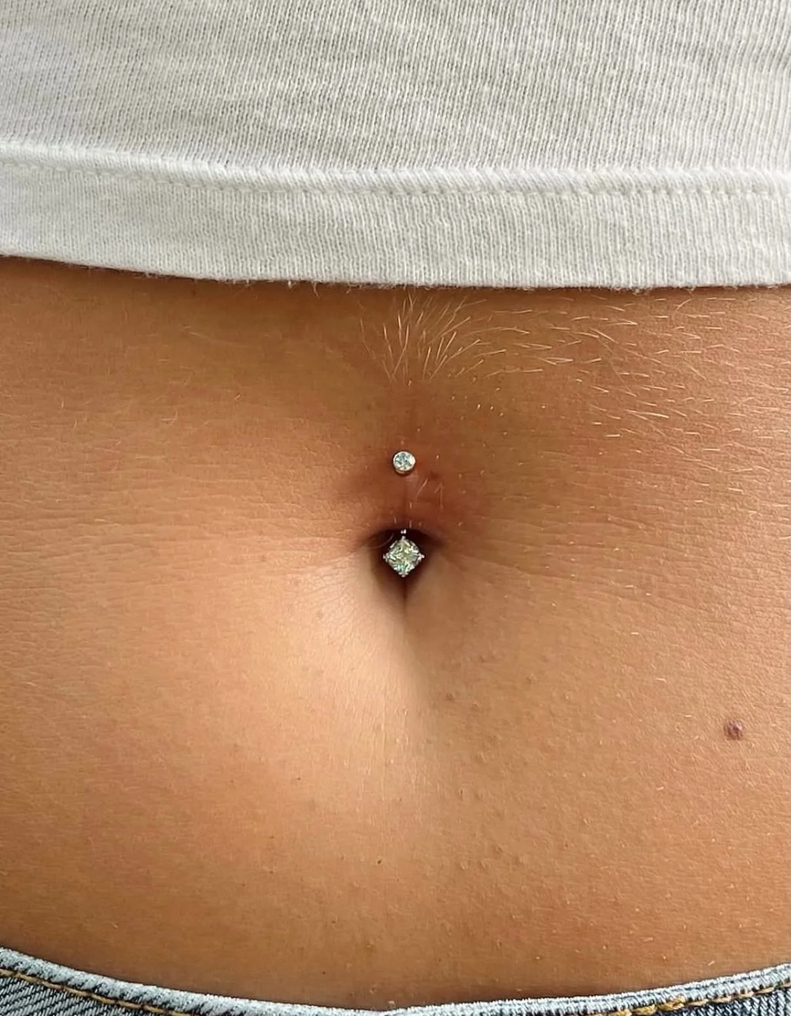 Tummy out season is nearly here. With an array of cuts + colors, you&rsquo;ll find the perfect navel jewelry for you for your fresh or healed piercing. Stop in today. ✨