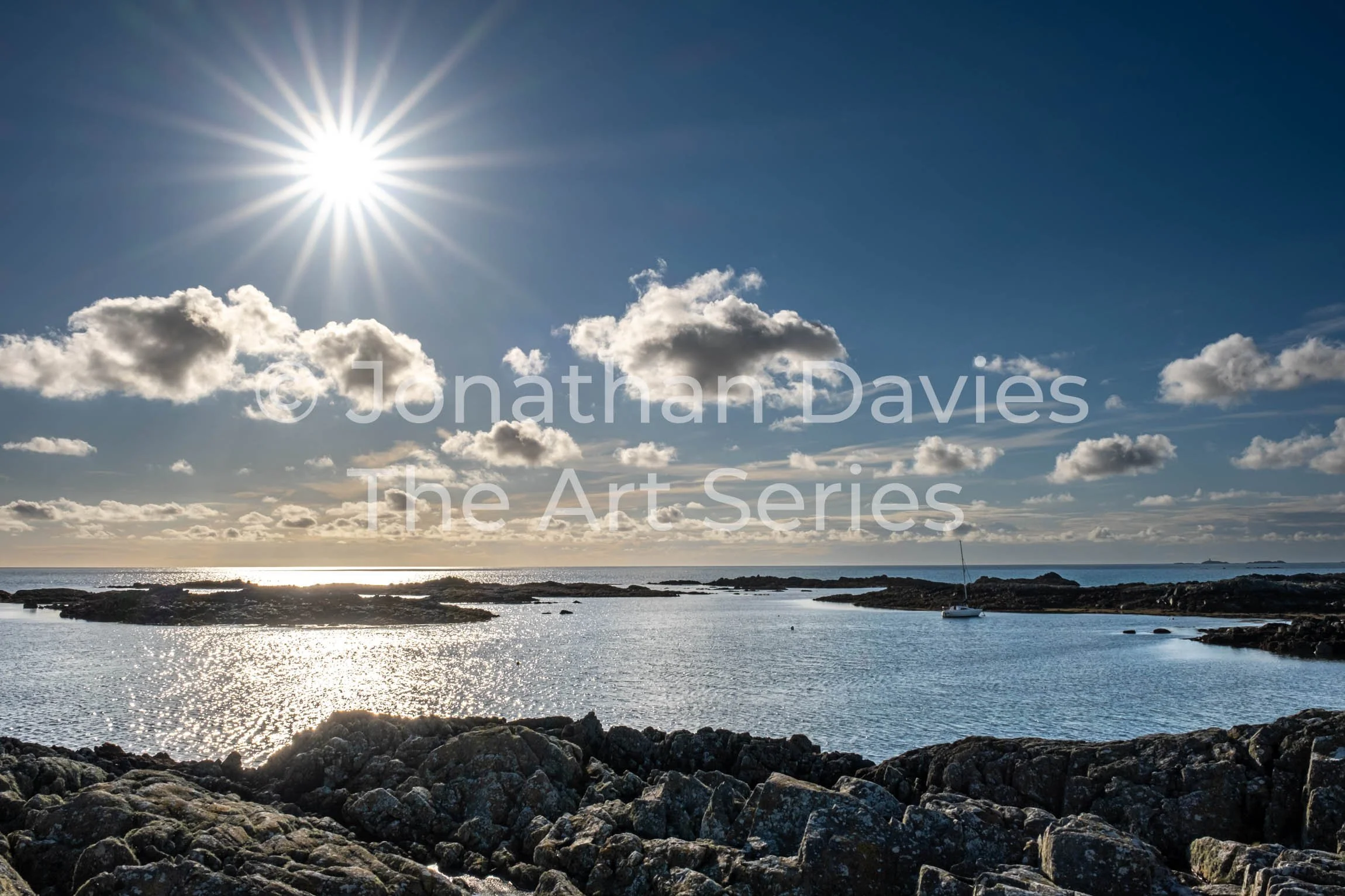 The evening sun glistening on the bay at Rhosneigr