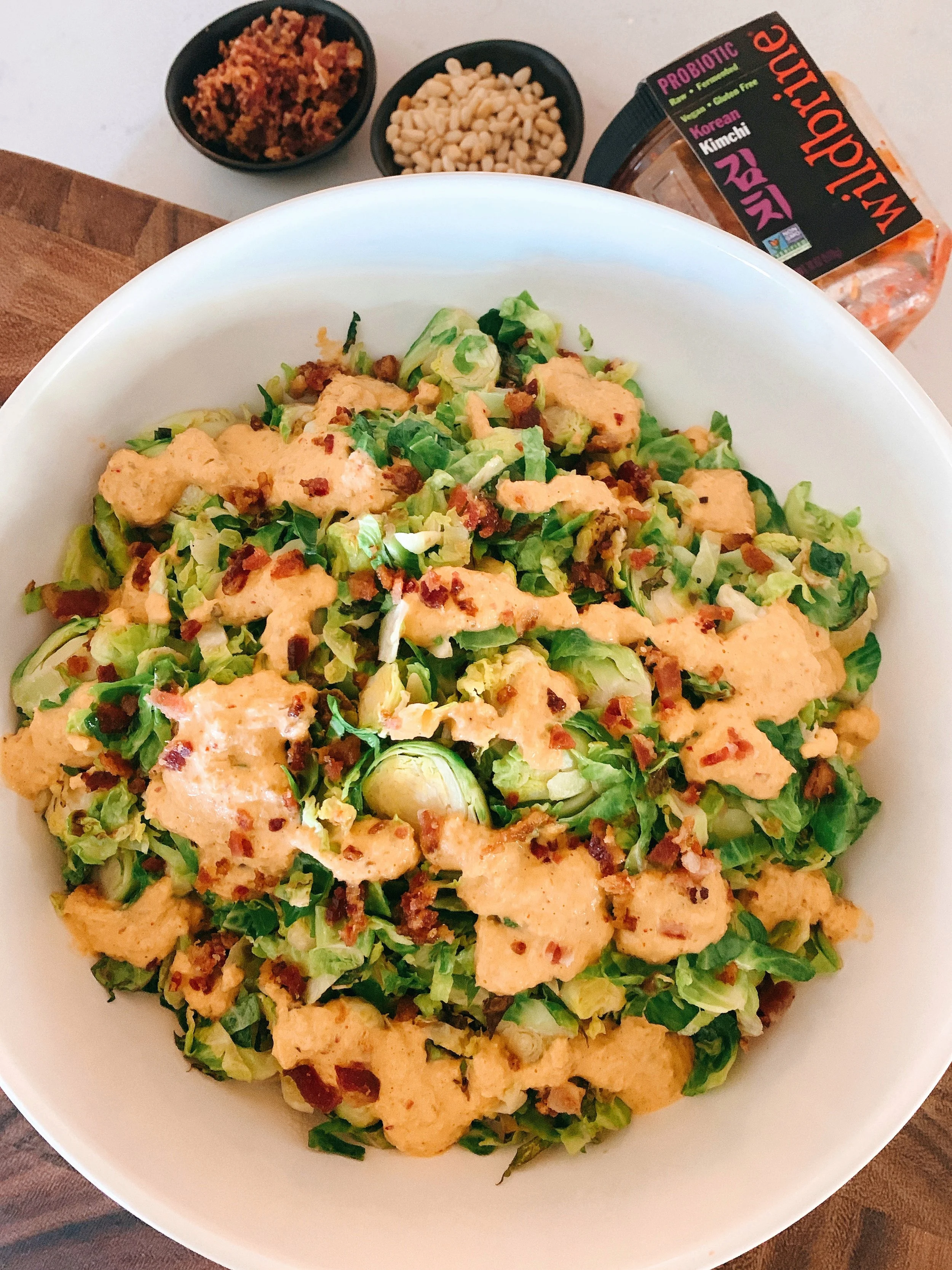 Shaved Brussel Sprouts with Kimchi Tahini Dressing