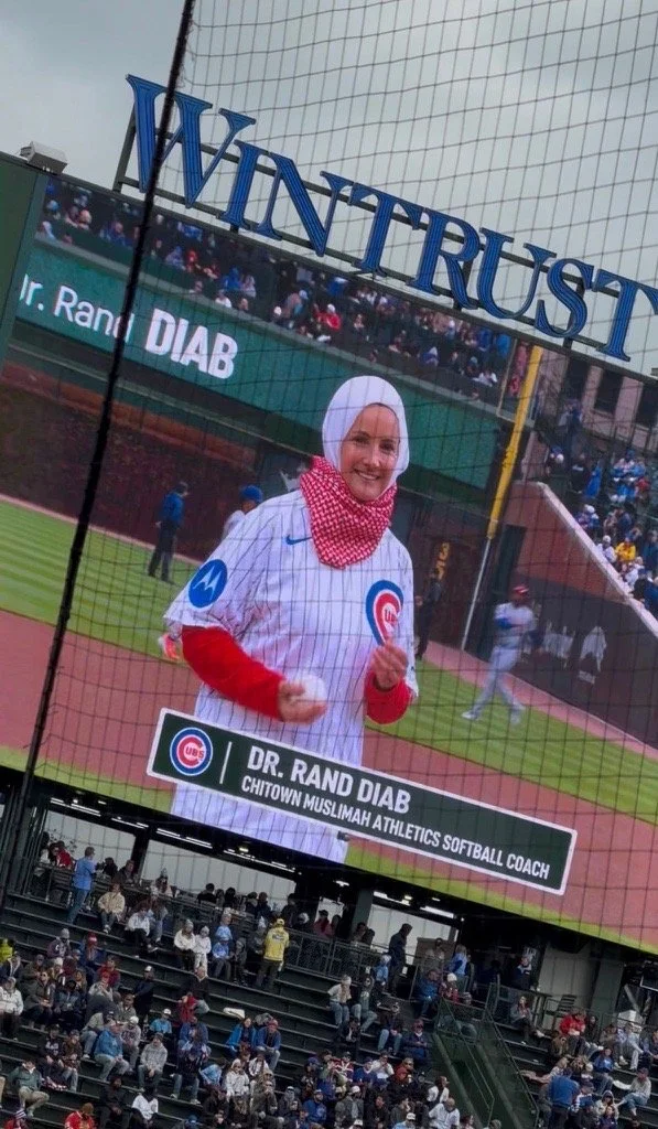 Dr. Rand Diab of ChiTown Muslimah Athletics Throws Out the First Pitch at Wrigley