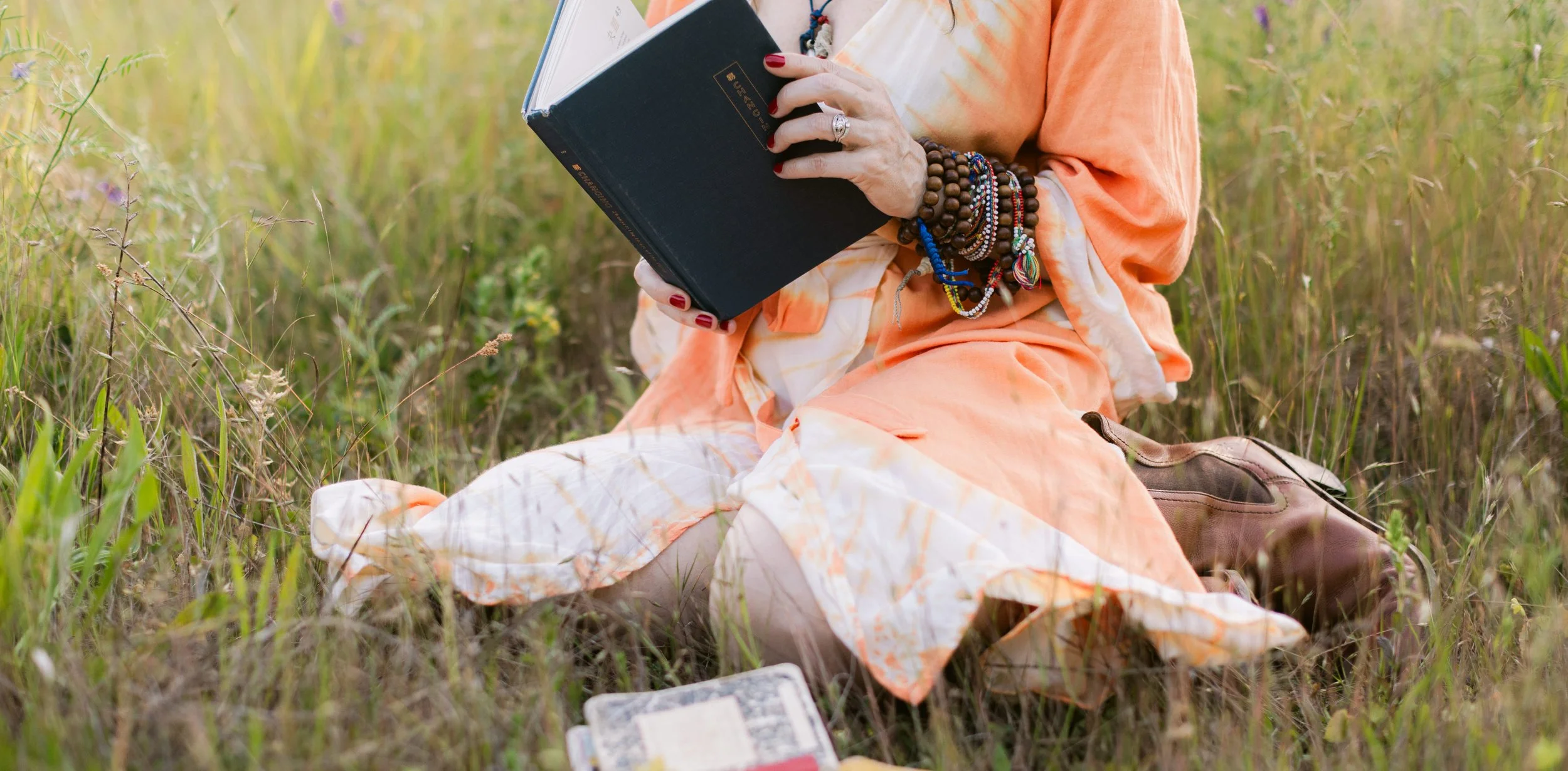Piper Reading in Grass Crop.jpg