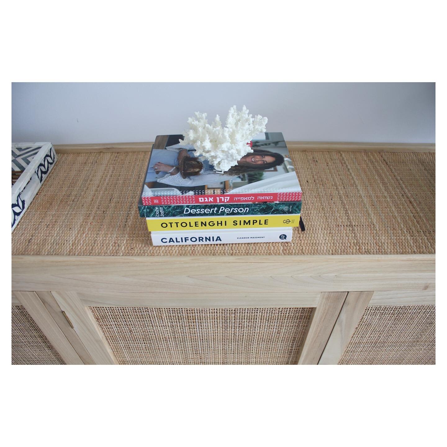 When displaying items in your living room- group them together and put only your favourite items out on display. DM to order this lovely coral and this rattan sideboard. 

📸Rivergate client&rsquo;s home. 
.
.
.
.
.

#singaporeinteriordesign
#singapo