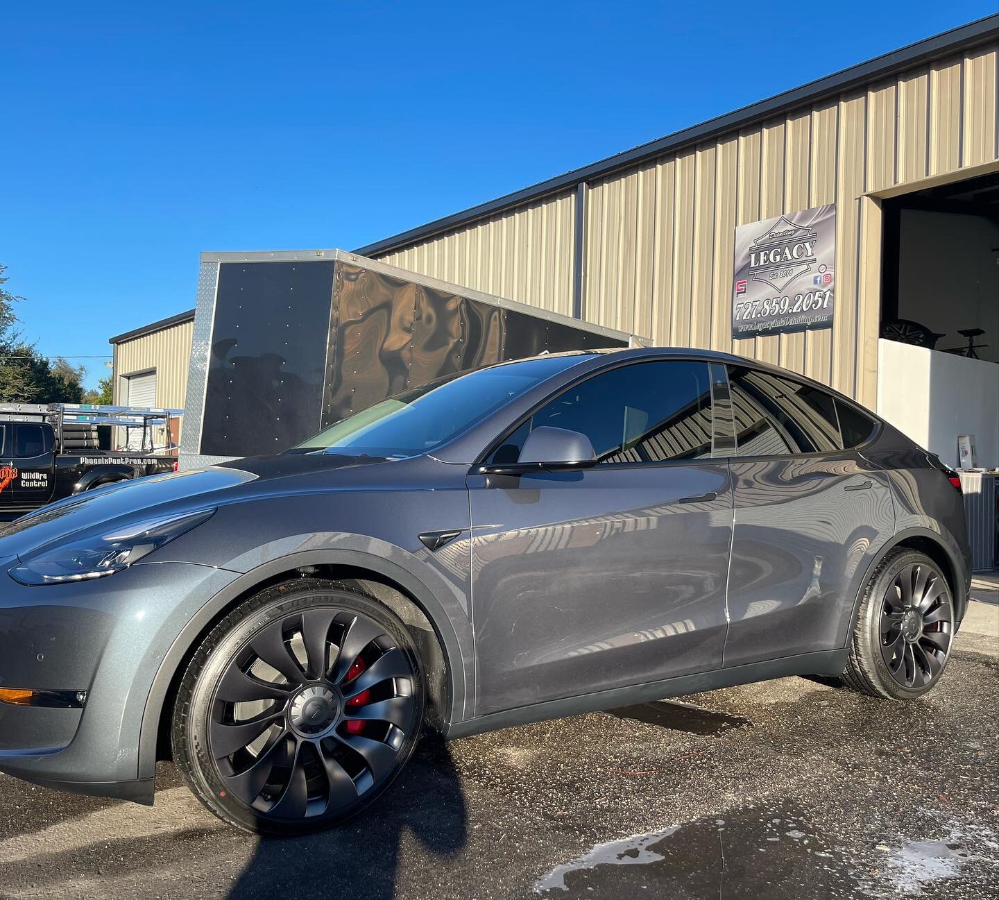 2022 Tesla Model Y received our Paint Correction and 5 year Ceramic coating Plus the windshield was coated along with the wheel faces!