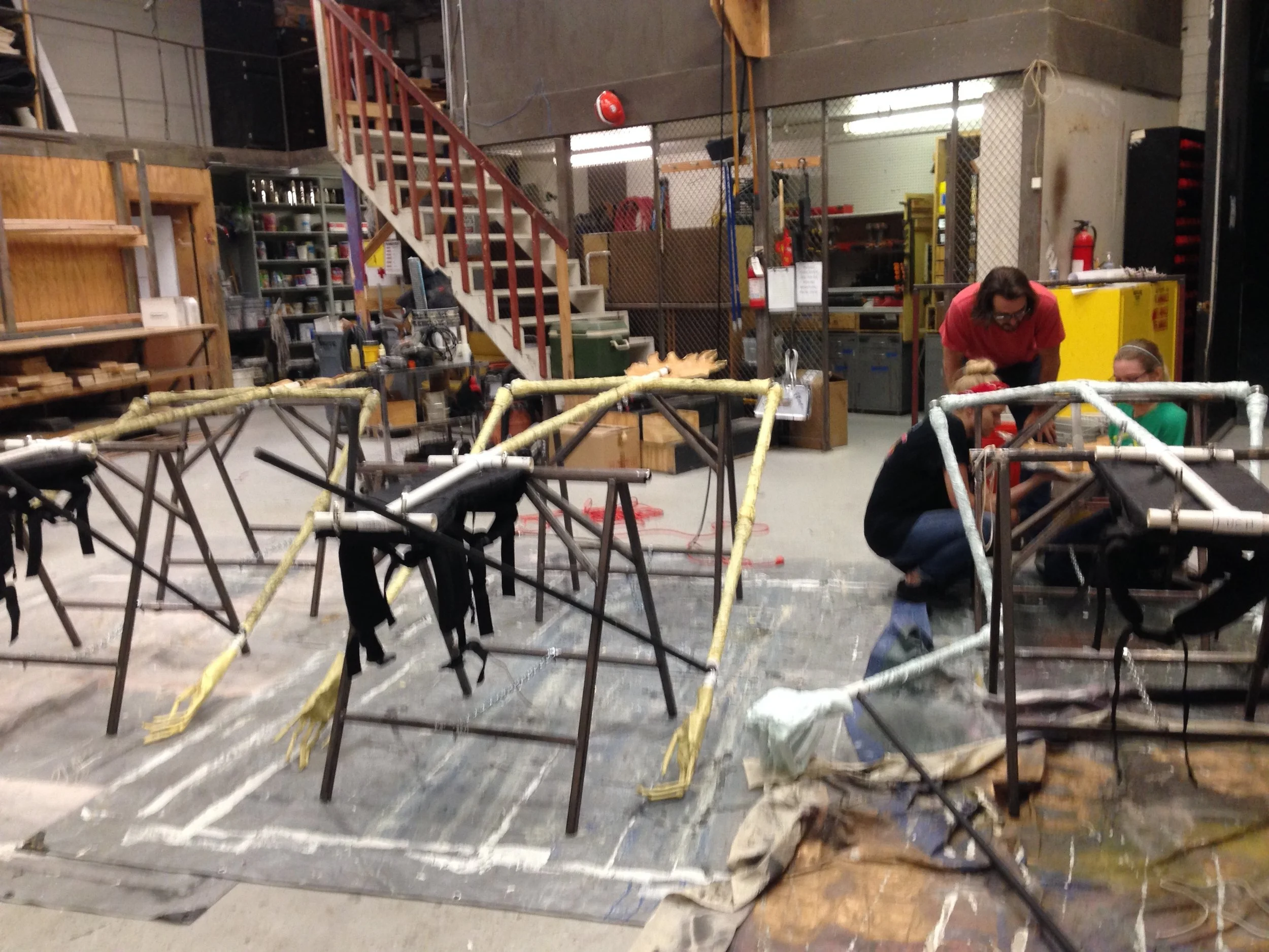  Help paint the puppets, attach them to harnesses, and glue hands on. 