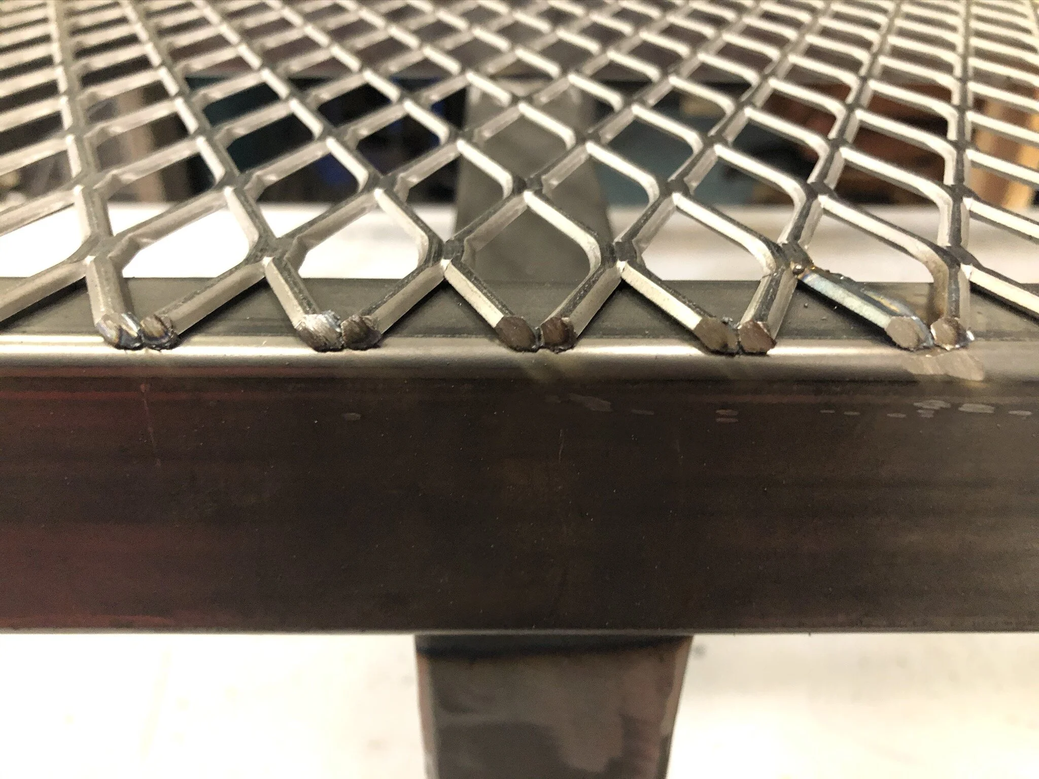  Trim the excess  of the expanded steel.  