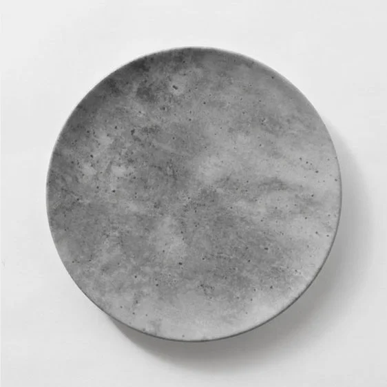 LUNAR MAIN | GREY CONCRECETE FINISH Porcelain with digital print Size : Diam. 30 cm IDR 38,000/per plate Qty Available: 80 pcs