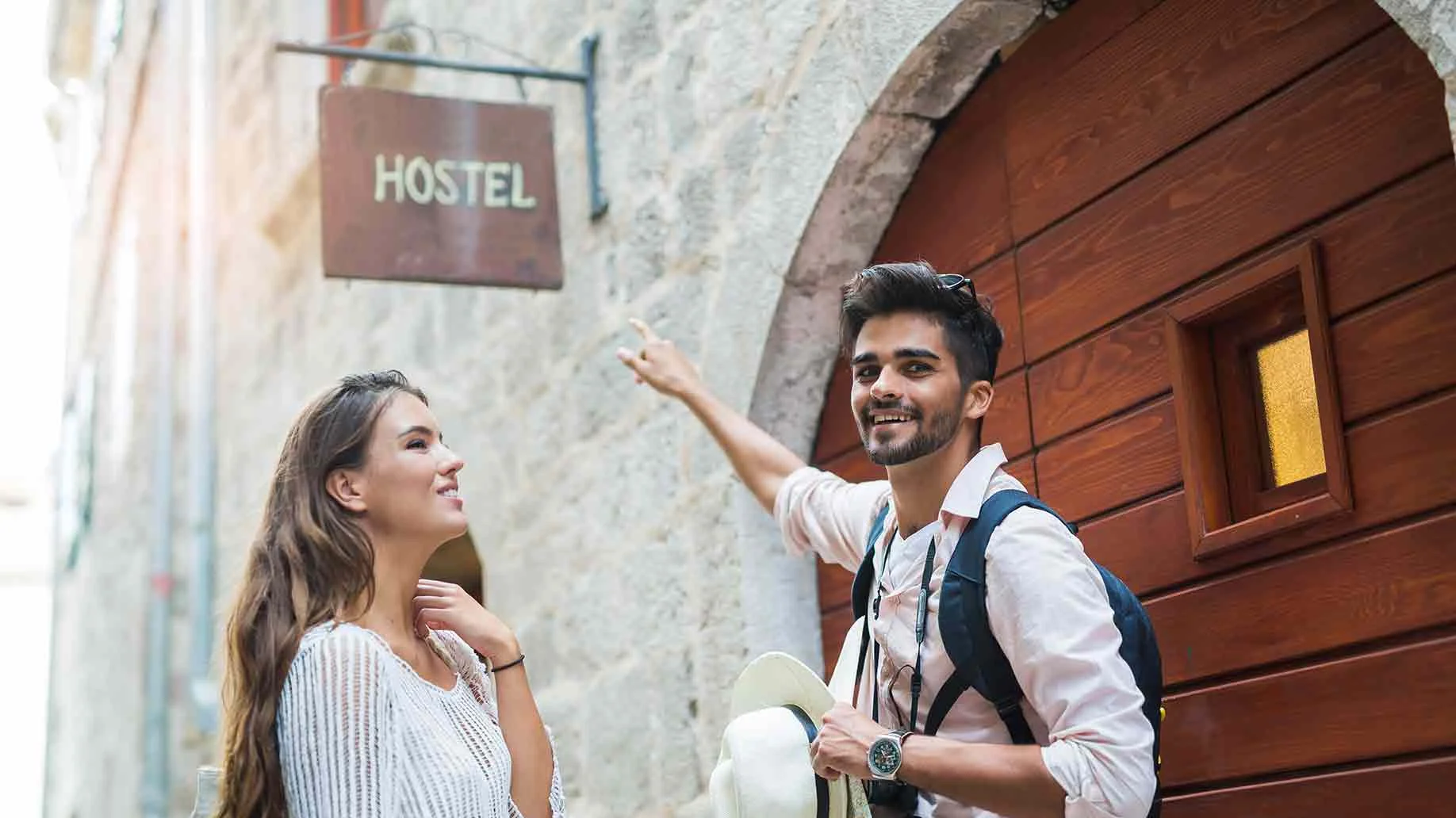 tourist-couple-enjoying-sightseeing-exploring-city.jpg