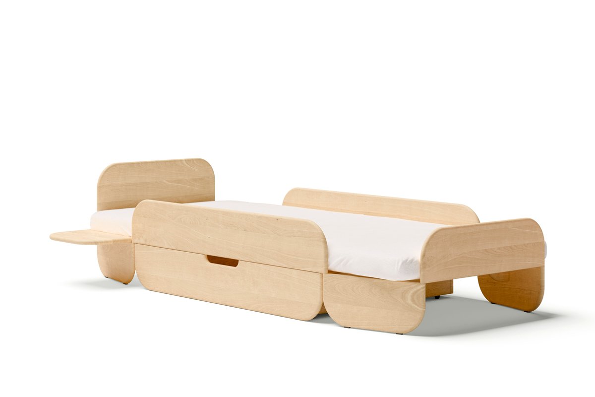  For extra storage space, there is an optional drawer that is placed under the middle section. It sits on the floor and slides out on wheels. 
