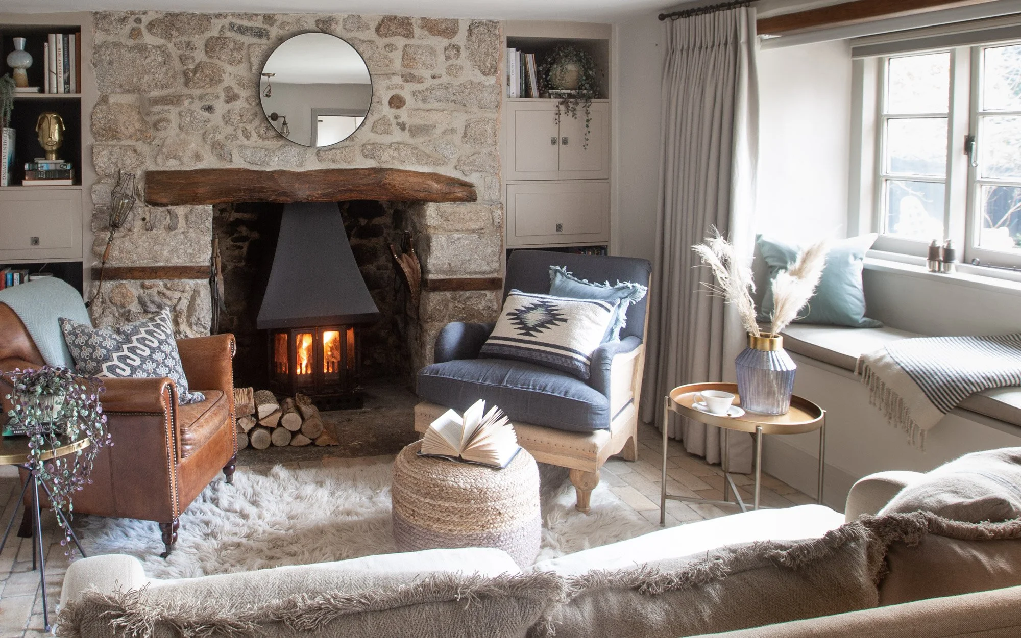 Cosy Dartmoor cottage living room with wood-burning stove