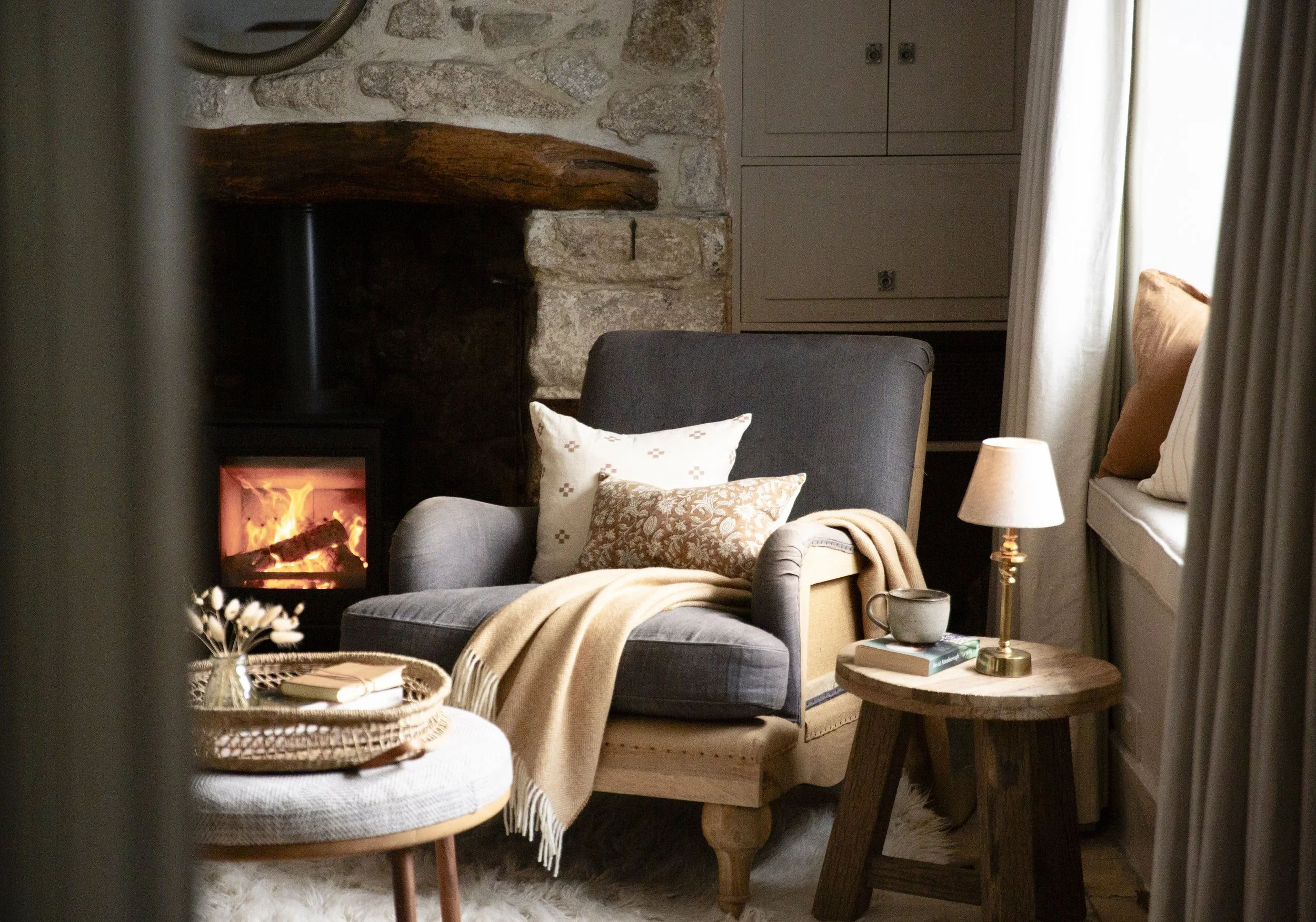 Cosy log-burning fire in cute Devon holiday cottage