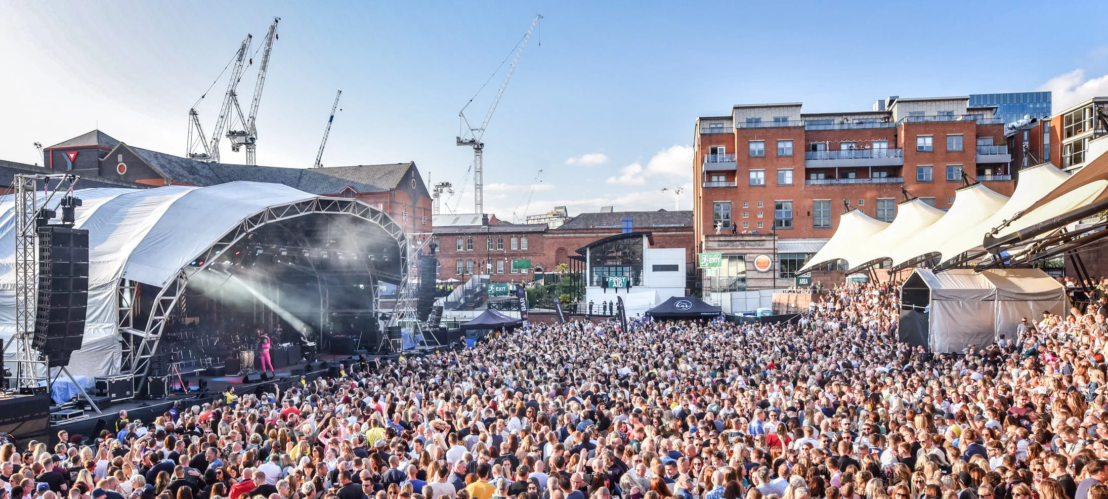 A packed Castlefield Bowl enjoying Inner City live in the sunshine