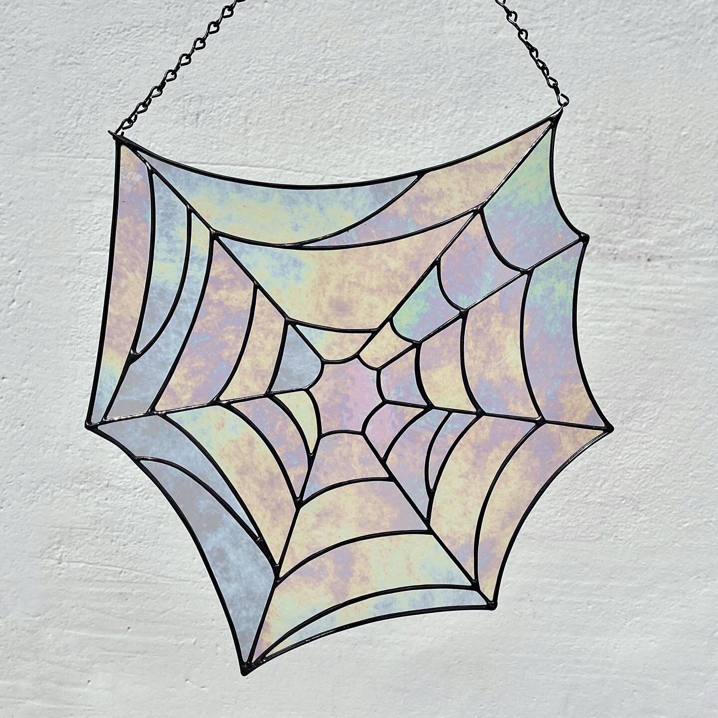 Happy Halloween everyone!!! 🕸️ 
I cut this spiderweb out in mid-September and just finally finished it today lol. But spooky season doesn&rsquo;t necessarily have to end today does it? 
If any of you want a giant iridescent spiderweb to hang in your