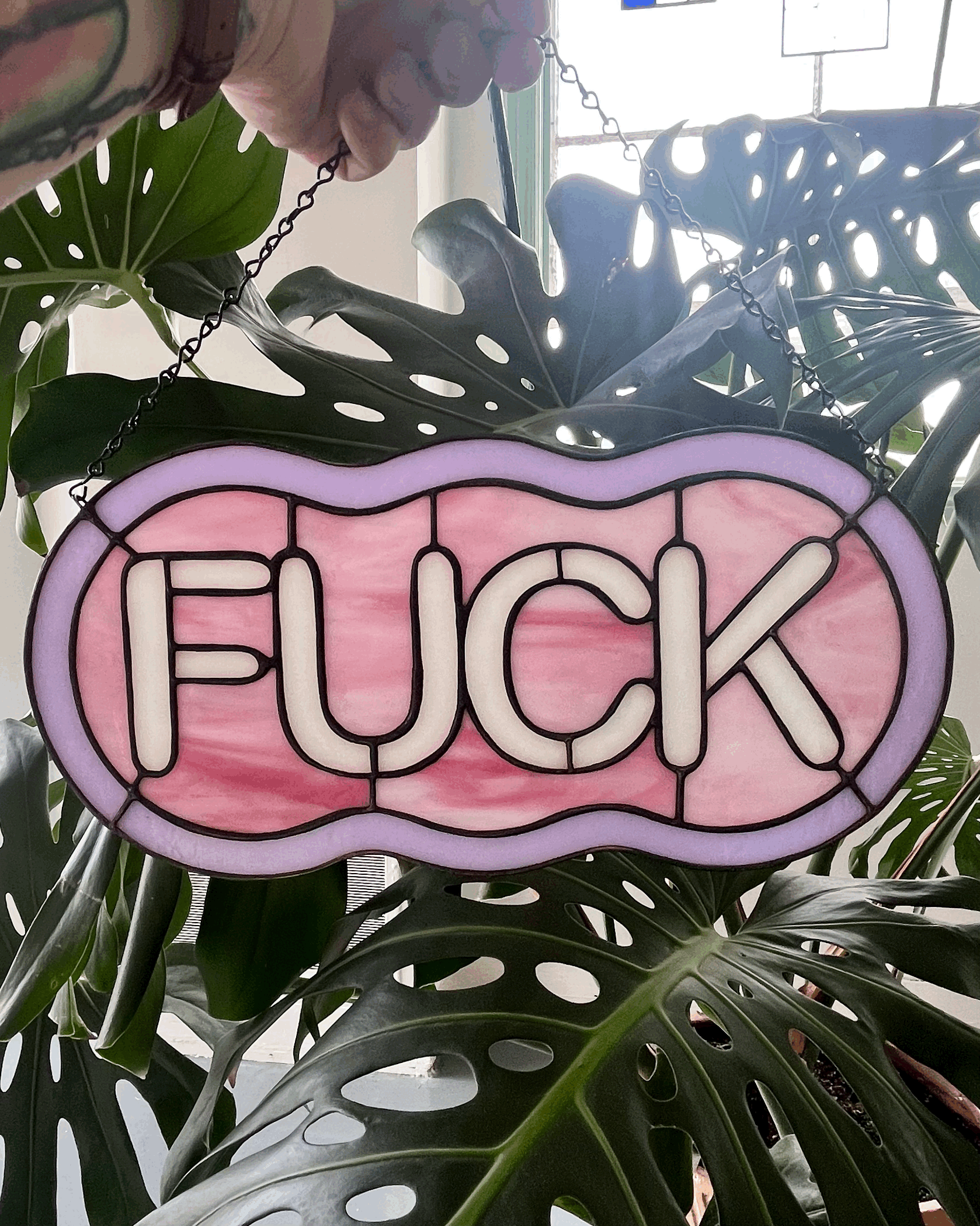 Daylight Glassworks FUCK stained Glass leaves background Made in Atlanta Day Kennedy