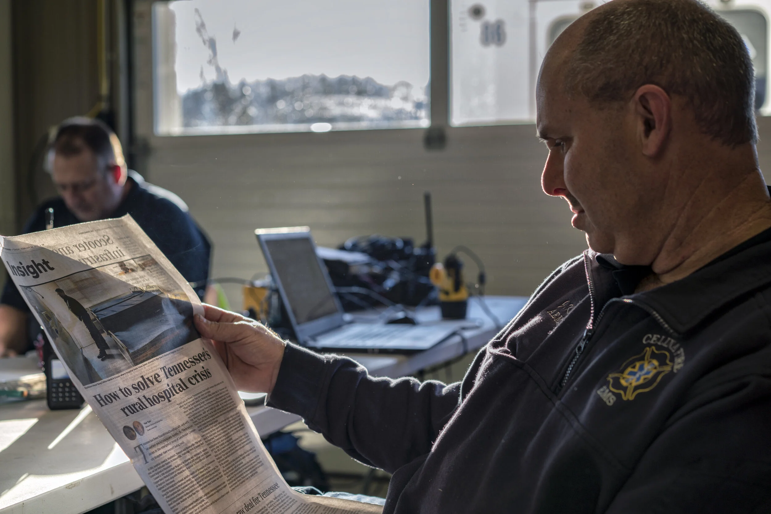 In the final days before the closure of Cumberland River Hospital, an EMS worker in Celina, Tennessee reads an article in the Tennessean about the epidemic of rural hospital closures in Tennessee.